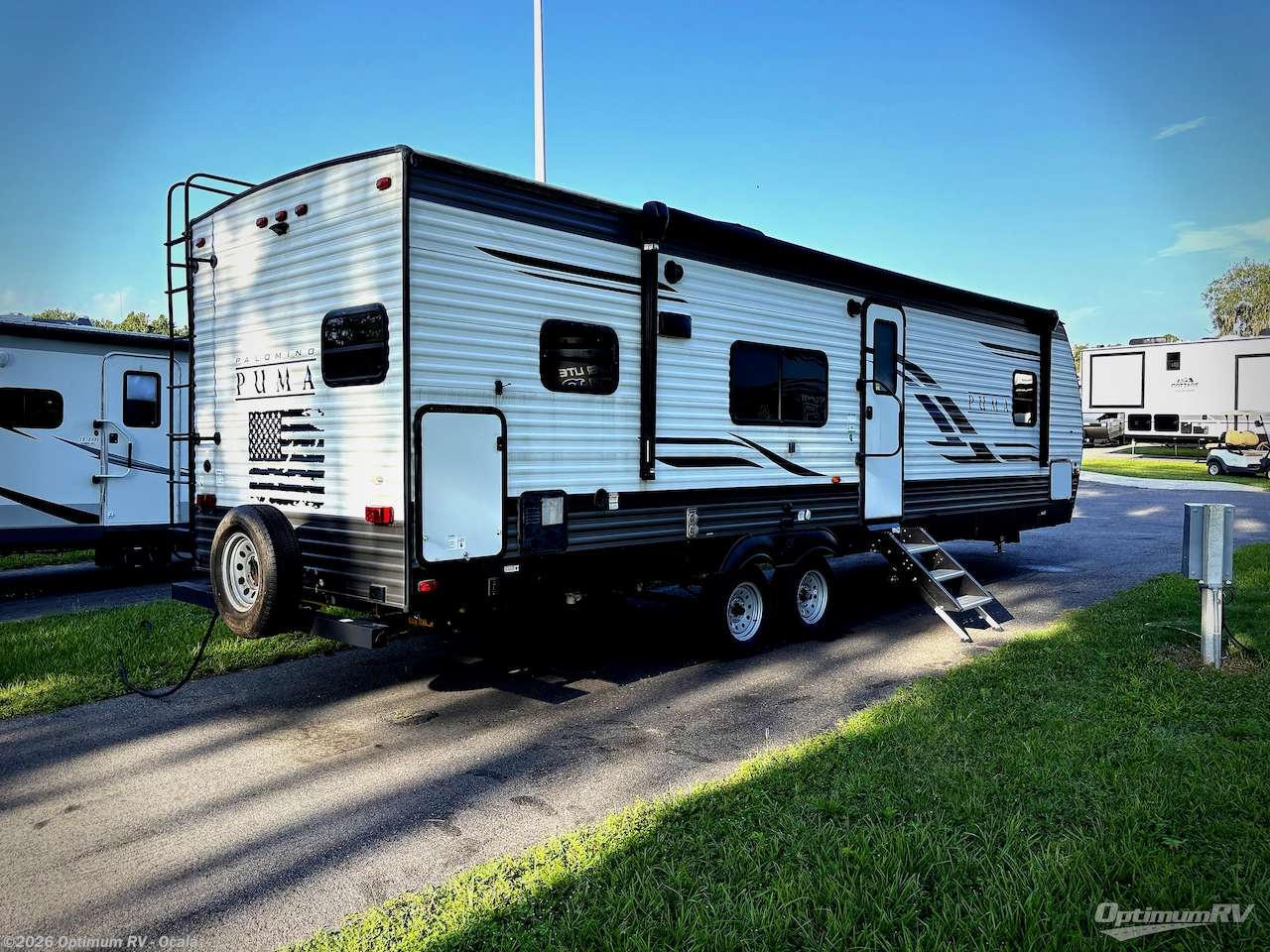 2021 Palomino Puma 28RKQS - Used Travel Trailer For Sale by Optimum RV - Ocala in Ocala, Florida features Awning, Slideout