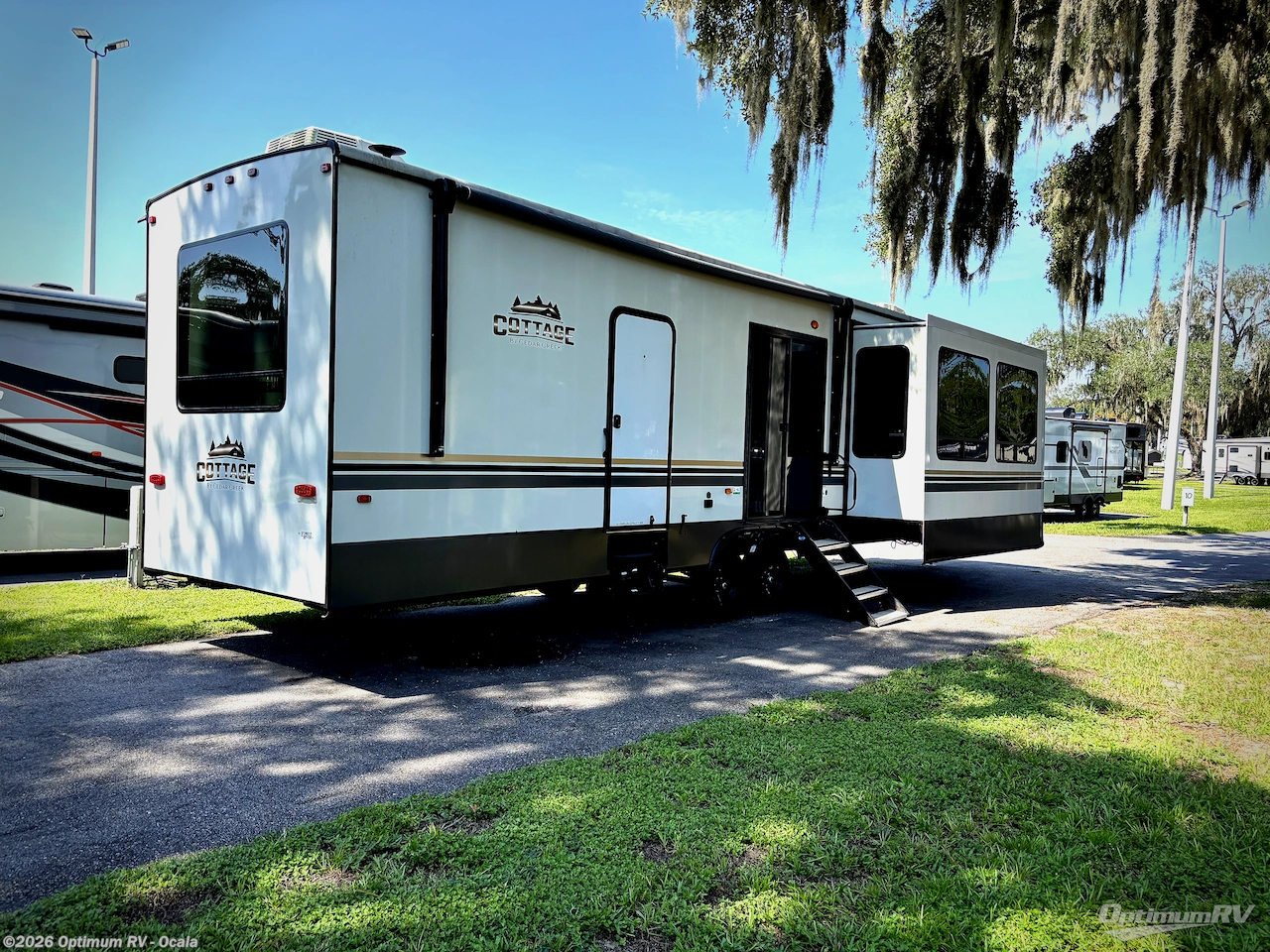 2023 Forest River Cedar Creek Cottage 40CFK2 - Used Destination Trailer For Sale by Optimum RV - Ocala in Ocala, Florida features Slideout, Awning