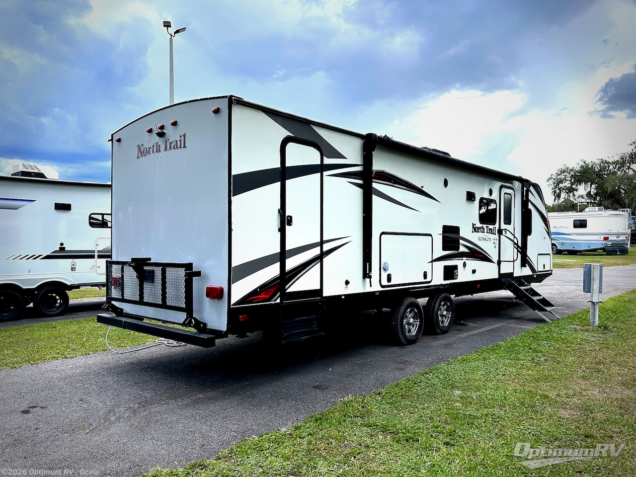 2018 Heartland North Trail 31BHDD King - Used Travel Trailer For Sale by Optimum RV - Ocala in Ocala, Florida features Slideout, Awning