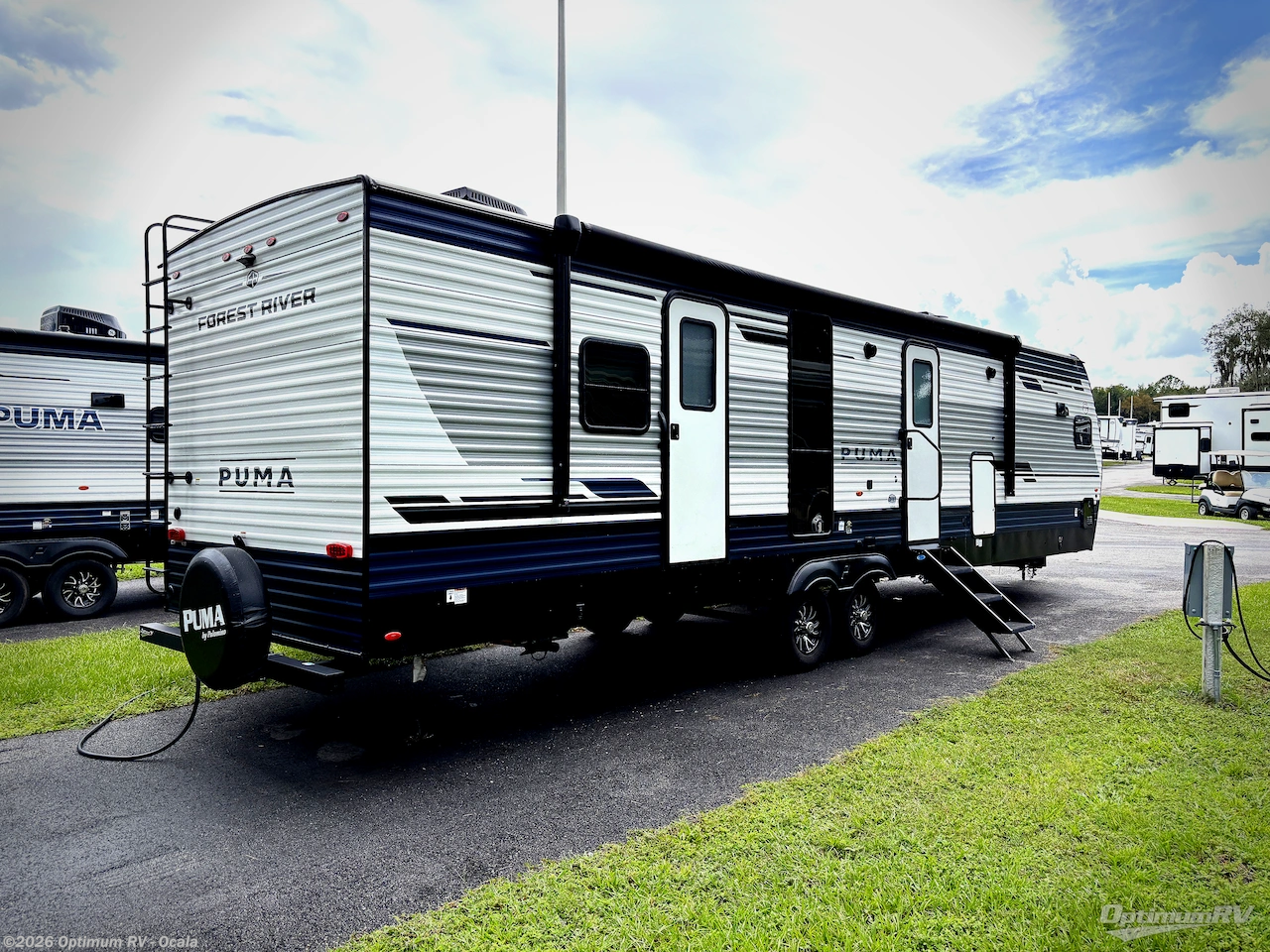 2025 Palomino Puma 31FKRK - Used Travel Trailer For Sale by Optimum RV - Ocala in Ocala, Florida features Awning, Slideout