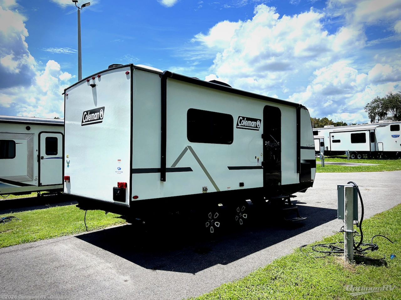 2025 Keystone Coleman Light 18RX - Used Travel Trailer For Sale by Optimum RV - Ocala in Ocala, Florida features Slideout, Awning