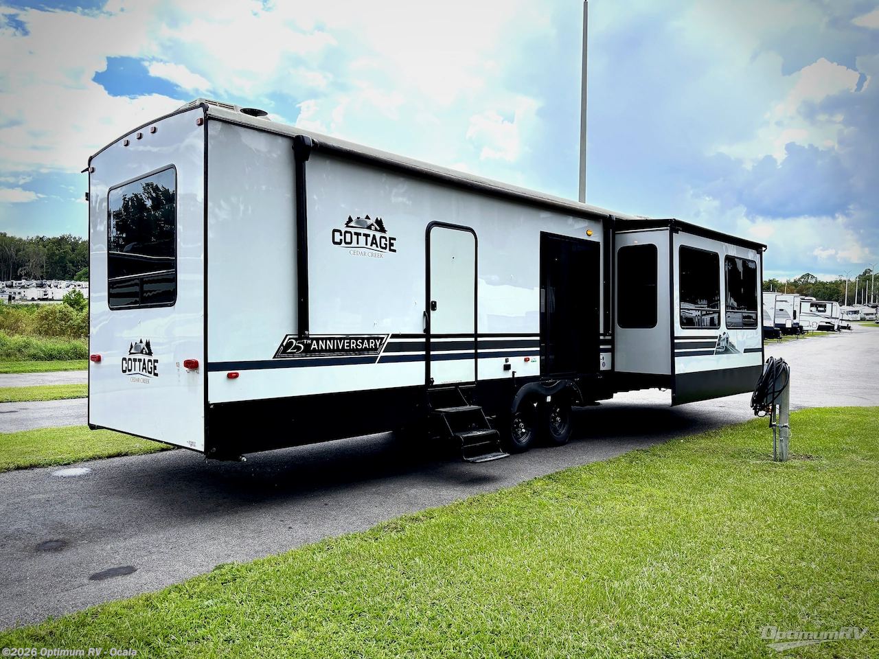 2024 Forest River Cedar Creek Cottage 40CFK2 - Used Destination Trailer For Sale by Optimum RV - Ocala in Ocala, Florida features Awning, Slideout