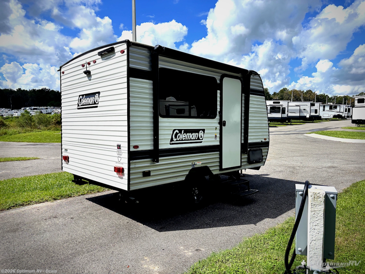 2026 Keystone Coleman 13R - Used Travel Trailer For Sale by Optimum RV - Ocala in Ocala, Florida features Awning