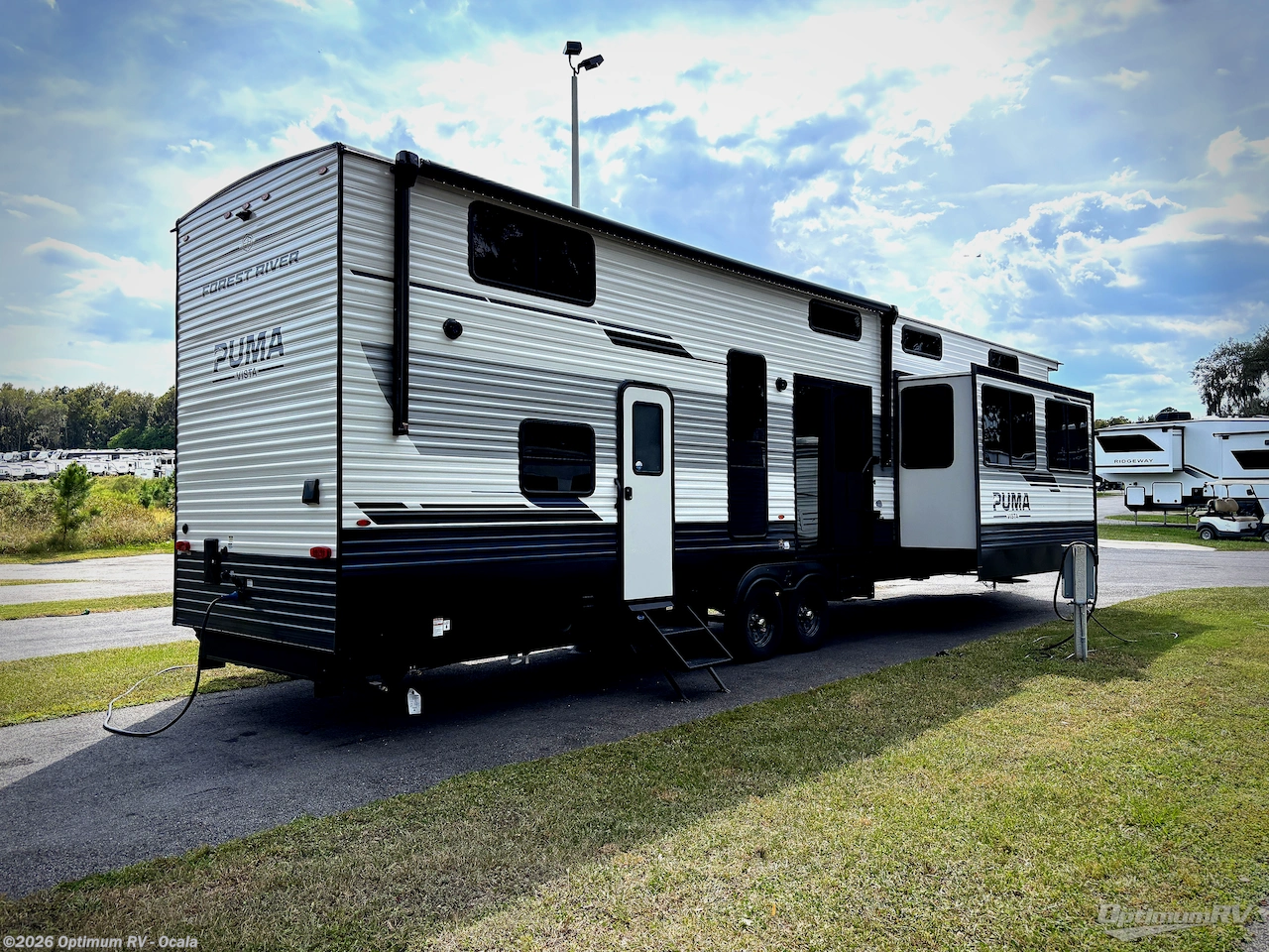 2027 Forest River Puma Vista 402LFT - New Destination Trailer For Sale by Optimum RV - Ocala in Ocala, Florida features Slideout, Awning