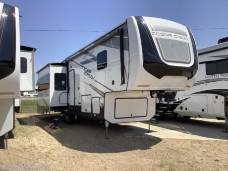 &lt;p&gt;&lt;strong&gt;This high end, rear living room unit is a good looking trailer!&lt;/strong&gt;&lt;/p&gt;
&lt;p&gt;&lt;strong&gt;Features Include:&lt;/strong&gt;&lt;/p&gt;
&lt;ul&gt;
&lt;li&gt;&lt;strong&gt;Cedar Creek Advantage Package&lt;/strong&gt;&lt;/li&gt;
&lt;li&gt;&lt;strong&gt;Cedar Creek Convenience Package&lt;/strong&gt;&lt;/li&gt;
&lt;li&gt;&lt;strong&gt;Power Package&lt;/strong&gt;&lt;/li&gt;
&lt;li&gt;&lt;strong&gt;Morryde Power Easy Reel&lt;/strong&gt;&lt;/li&gt;
&lt;li&gt;&lt;strong&gt;Deep Cell Battery&lt;/strong&gt;&lt;/li&gt;
&lt;li&gt;&lt;strong&gt;190 Watt Go Power Solar Panel&lt;/strong&gt;&lt;/li&gt;
&lt;li&gt;&lt;strong&gt;Slide Room Awning Toppers&lt;/strong&gt;&lt;/li&gt;
&lt;li&gt;&lt;strong&gt;Luxury King Mattress&lt;/strong&gt;&lt;/li&gt;
&lt;li&gt;&lt;strong&gt;Self Regulating Bedroom Wall Heater&lt;/strong&gt;&lt;/li&gt;
&lt;li&gt;&lt;strong&gt;Dual Pane Tinted Windows&lt;/strong&gt;&lt;/li&gt;
&lt;li&gt;&lt;strong&gt;Trailair Ride Hitch Coupler&lt;/strong&gt;&lt;/li&gt;
&lt;li&gt;&lt;strong&gt;CO2 Detector&lt;/strong&gt;&lt;/li&gt;
&lt;/ul&gt;
&lt;p&gt;&lt;strong&gt;Please feel free to call our sales staff with any other questions you may have!!&lt;/strong&gt;&lt;/p&gt;