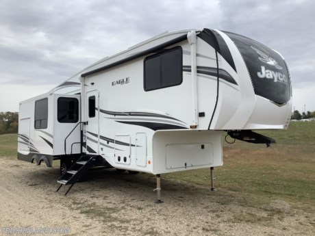 &lt;p&gt;&lt;strong&gt;This is a nice, rear, entertainment center trailer!&lt;/strong&gt;&lt;/p&gt;
&lt;p&gt;&lt;strong&gt;Features Include:&lt;/strong&gt;&lt;/p&gt;
&lt;ul&gt;
&lt;li&gt;&lt;strong&gt;Customer Value Package&lt;/strong&gt;&lt;/li&gt;
&lt;li&gt;&lt;strong&gt;Luxury Package&lt;/strong&gt;&lt;/li&gt;
&lt;li&gt;&lt;strong&gt;Four Star Handling Package&lt;/strong&gt;&lt;/li&gt;
&lt;li&gt;&lt;strong&gt;Solar Package&lt;/strong&gt;&lt;/li&gt;
&lt;li&gt;&lt;strong&gt;Standard Camping Package&lt;/strong&gt;&lt;/li&gt;
&lt;li&gt;&lt;strong&gt;Roof Vent in Bedroom&lt;/strong&gt;&lt;/li&gt;
&lt;li&gt;&lt;strong&gt;10 Cu Ft 12V Fridge&lt;/strong&gt;&lt;/li&gt;
&lt;li&gt;&lt;strong&gt;Observation System Prep&lt;/strong&gt;&lt;/li&gt;
&lt;li&gt;&lt;strong&gt;Tinted Safety Glass Windows&lt;/strong&gt;&lt;/li&gt;
&lt;li&gt;&lt;strong&gt;Roof Ladder&lt;/strong&gt;&lt;/li&gt;
&lt;li&gt;&lt;strong&gt;15&quot; Tires&lt;/strong&gt;&lt;/li&gt;
&lt;li&gt;&lt;strong&gt;Free Standing Table &amp;amp; Chairs with Bench Seat&lt;/strong&gt;&lt;/li&gt;
&lt;li&gt;&lt;strong&gt;Queen Beds&lt;/strong&gt;&lt;/li&gt;
&lt;/ul&gt;
&lt;p&gt;&lt;strong&gt;Please feel free to call our sales staff with any other questions you may have!!&lt;/strong&gt;&lt;/p&gt;