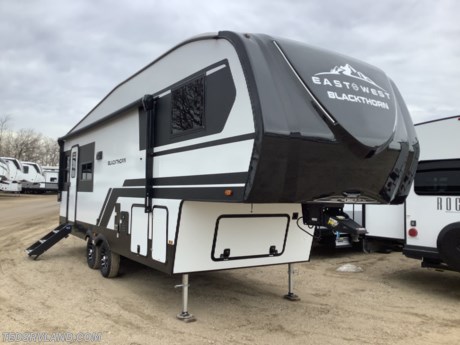&lt;p&gt;&lt;strong&gt;This short, couples coach is perfect for pulling the boat behind!&lt;/strong&gt;&lt;/p&gt;
&lt;p&gt;&lt;strong&gt;Features Include:&lt;/strong&gt;&lt;/p&gt;
&lt;ul&gt;
&lt;li&gt;&lt;strong&gt;Half Ton Luxury Package&lt;/strong&gt;&lt;/li&gt;
&lt;li&gt;&lt;strong&gt;Half Ton Four Seasons Package&lt;/strong&gt;&lt;/li&gt;
&lt;li&gt;&lt;strong&gt;Half Ton Towing Package&lt;/strong&gt;&lt;/li&gt;
&lt;li&gt;&lt;strong&gt;King Bed&lt;/strong&gt;&lt;/li&gt;
&lt;li&gt;&lt;strong&gt;Theater Seating&lt;/strong&gt;&lt;/li&gt;
&lt;li&gt;&lt;strong&gt;4 Point Electric Auto Leveling System&lt;/strong&gt;&lt;/li&gt;
&lt;li&gt;&lt;strong&gt;200 Watt Solar Package&lt;/strong&gt;&lt;/li&gt;
&lt;li&gt;&lt;strong&gt;Good Year Tires&lt;/strong&gt;&lt;/li&gt;
&lt;li&gt;&lt;strong&gt;2&quot; Towing Hitch&lt;/strong&gt;&lt;/li&gt;
&lt;/ul&gt;
&lt;p&gt;&lt;strong&gt;Please feel free to call our sales staff with any other questions you may have!!&lt;/strong&gt;&lt;/p&gt;