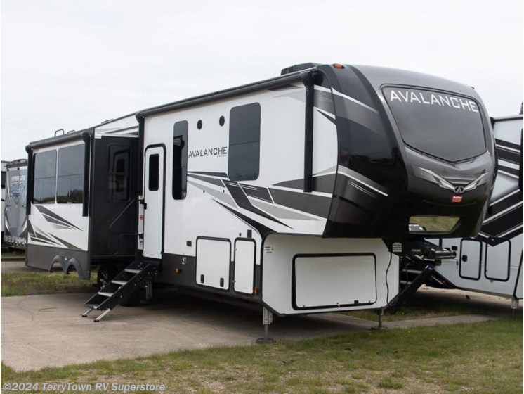 Used 2021 Keystone Avalanche 312RS available in Grand Rapids, Michigan