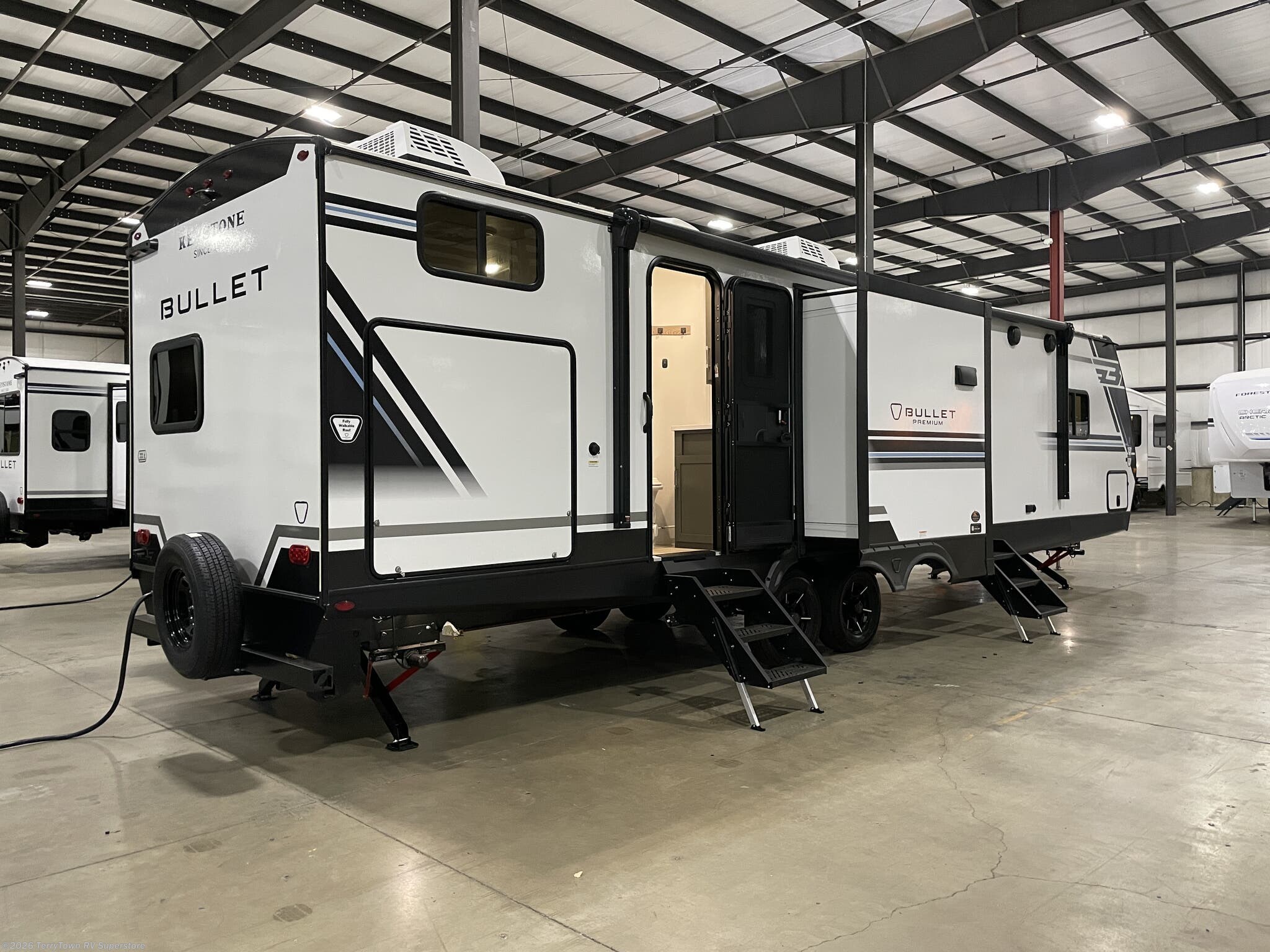 2026 Bullet Premium 330BKQ by Keystone from TerryTown RV Superstore in Grand Rapids, Michigan
