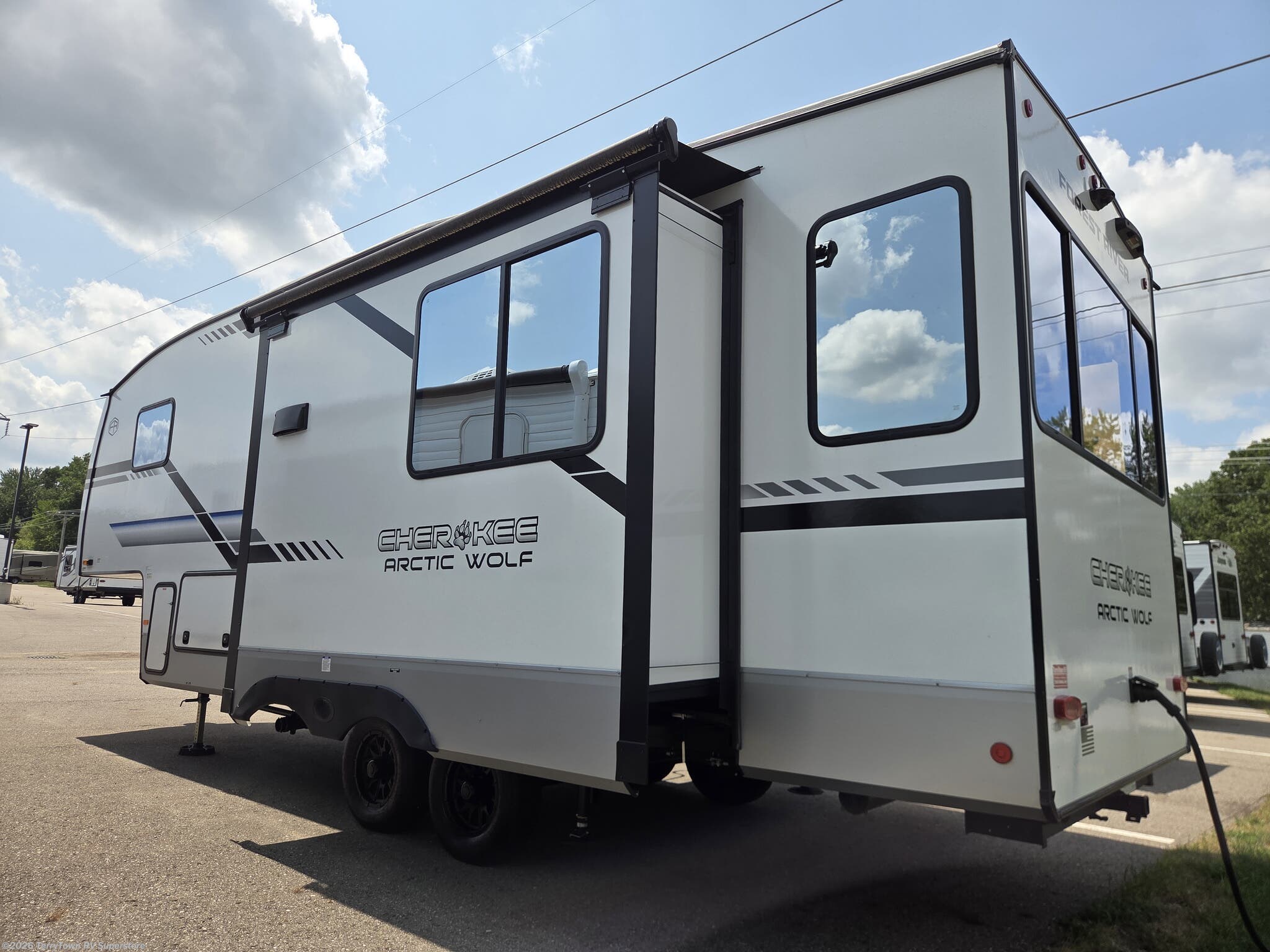Used 2024 Forest River Cherokee Arctic Wolf 27SGS available in Grand Rapids, Michigan