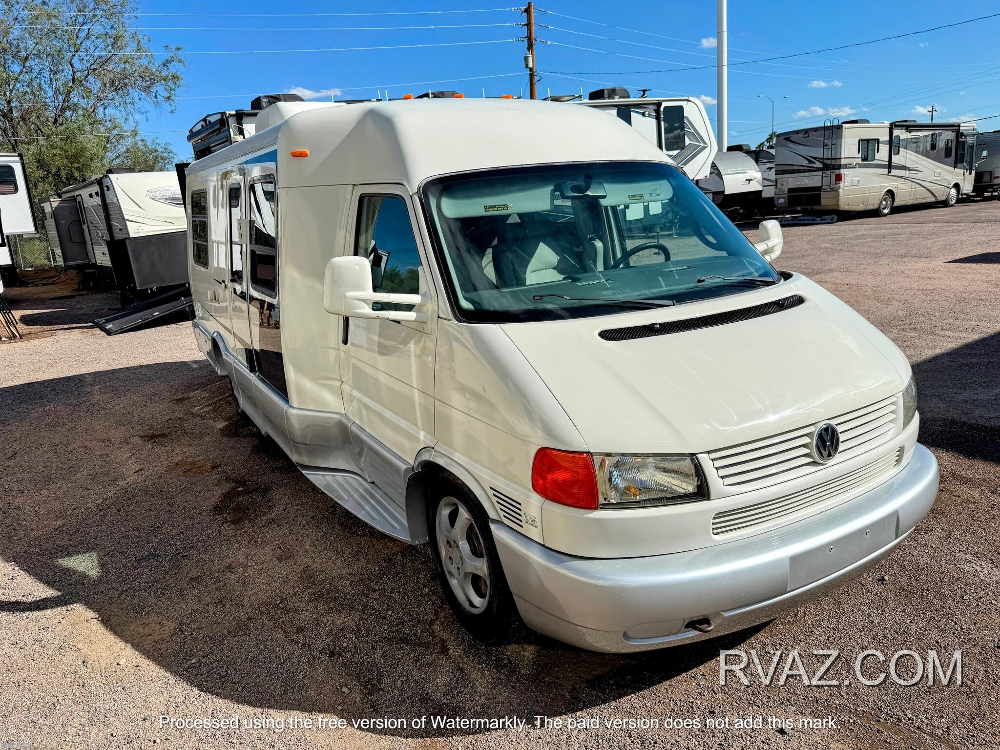 2003 Winnebago Rialta 22QD - Used Class B For Sale by RV AZ Corral in Mesa, Arizona features TV Antenna, Toilet, Refrigerator, Air Conditioning, Generator