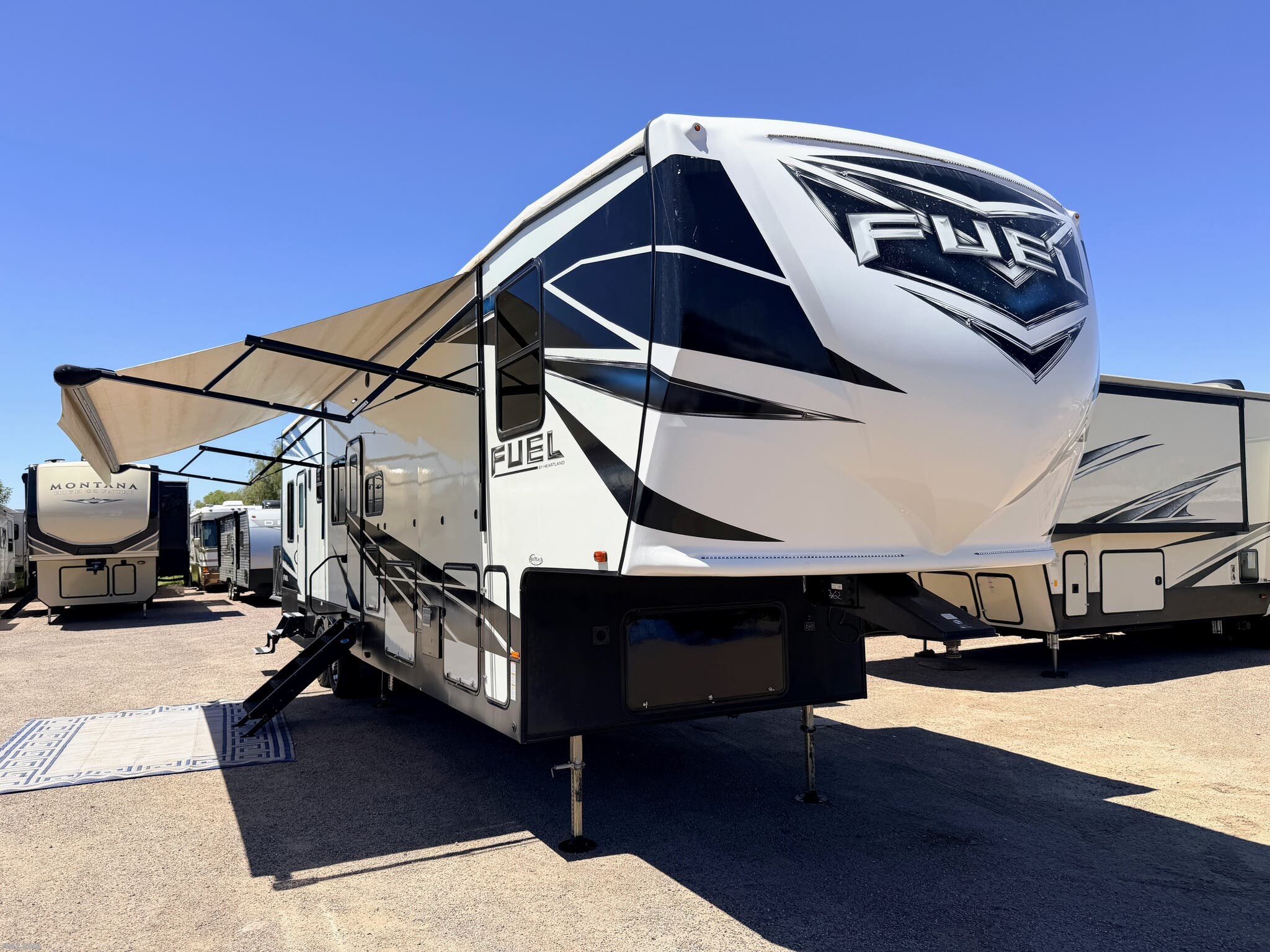 2020 Heartland Fuel 362 - Used Toy Hauler For Sale by RV AZ Corral in Mesa, Arizona features Black Tank Flush, Automatic Leveling Jacks, Kitchen Sink, TV, Exterior Speakers