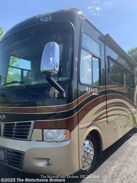 2010 Monaco RV Monarch 33SDD (in Grantville, PA) - Used Class A For Sale by The Motorhome Brokers in Salisbury, Maryland features SS Wheel Covers, Power Awning, Queen Bed, Wardrobe(s), Second Roof A/C