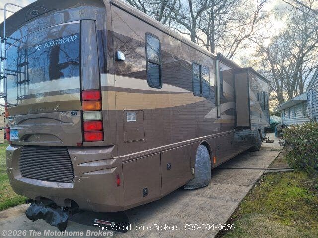 2007 Fleetwood Revolution LE 40E (in Mystic, CT) - Used Diesel Pusher For Sale by The Motorhome Brokers in Salisbury, Maryland features Full Body Paint, Queen Bed, Thermal Pane Windows, Converter, Solid Surface Countertops