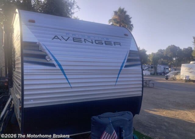 2021 Prime Time Avenger 27RKS (in Corona, CA) - Used Travel Trailer For Sale by The Motorhome Brokers in Salisbury, Maryland features Refrigerator, Roof Vents, TV Antenna, Water Heater, Non-Smoking Unit
