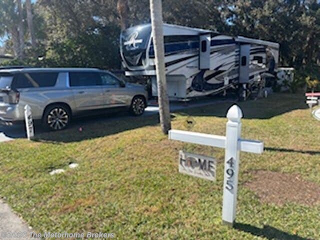 2022 Forest River RiverStone 39RKFB (in Titusville, FL) - Used Fifth Wheel For Sale by The Motorhome Brokers in Salisbury, Maryland features Rocker Recliner(s), Batteries, Sofa Bed, Outside Entertainment Center, Power Roof Vent
