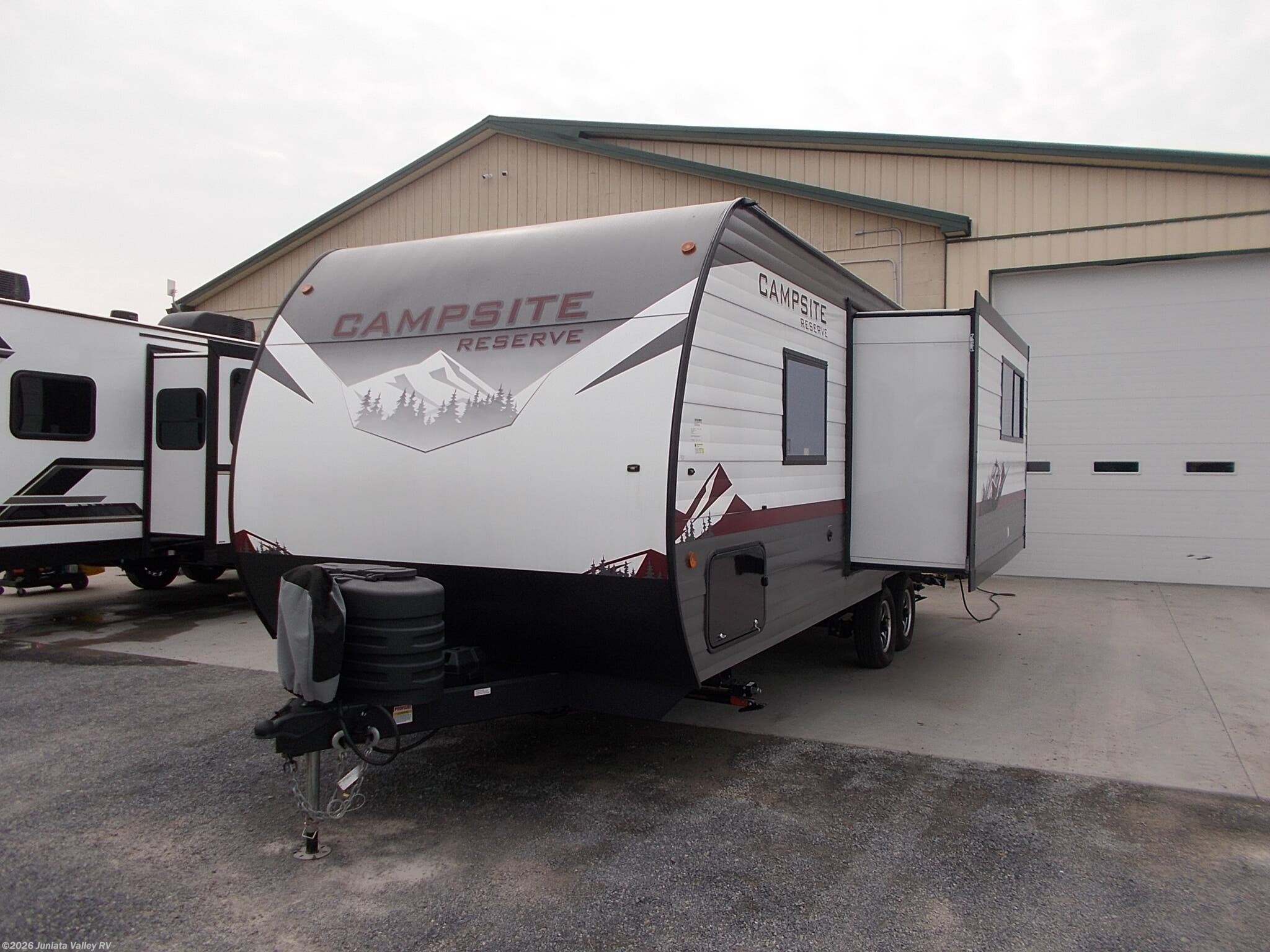 2024 Forest River Campsite Reserve 23CC - Used Travel Trailer For Sale by Juniata Valley RV in Mifflintown, Pennsylvania features Stabilizer Jacks, Vanity, Refrigerator (12V), Stove Top Burner, Tankless Demand Gas Water Heater