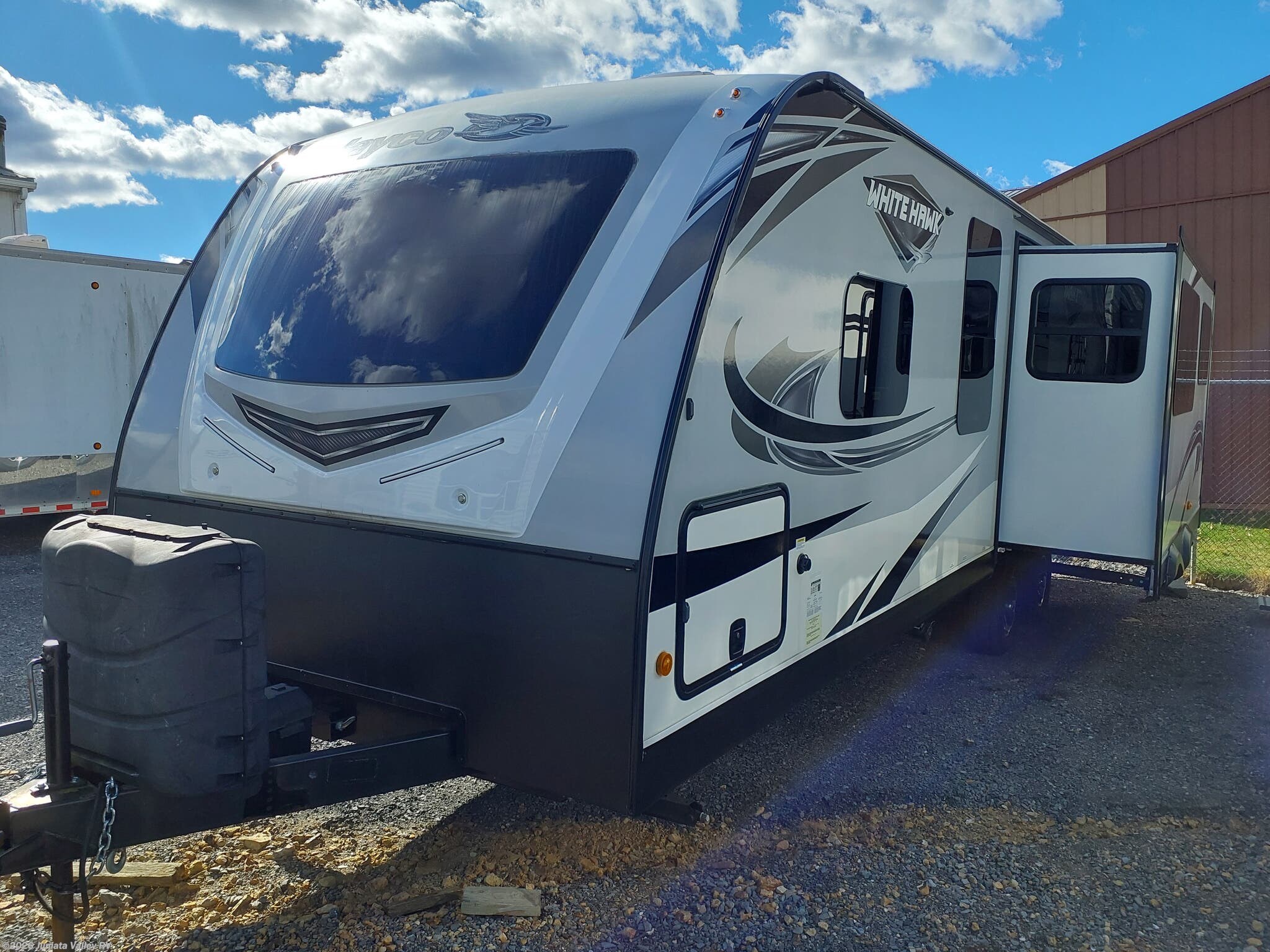 2020 Jayco White Hawk 28RL - Used Travel Trailer For Sale by Juniata Valley RV in Mifflintown, Pennsylvania features Slideout, Queen Bed, Fire Extinguisher, Stove Cover, Ladder