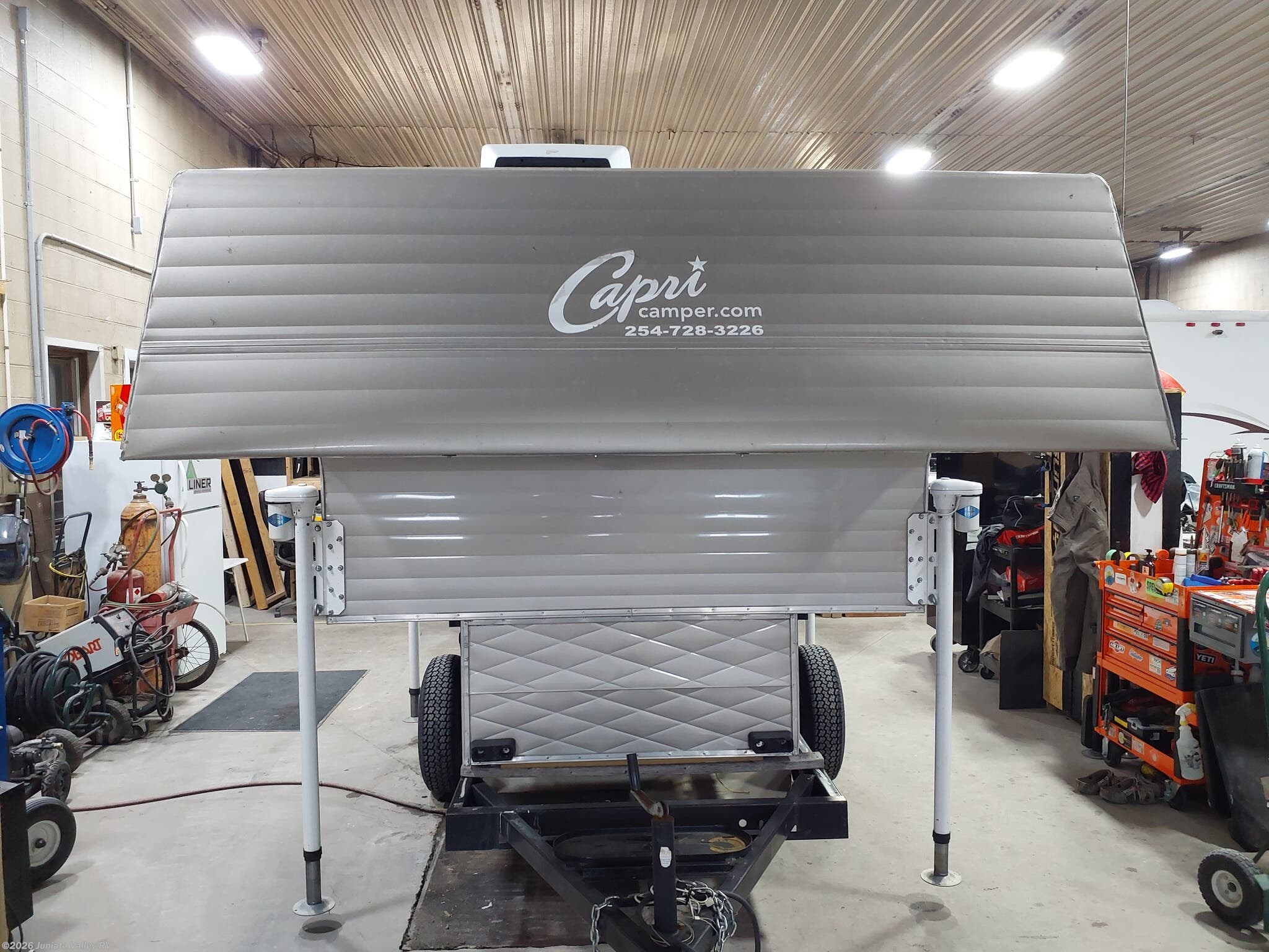 2021 Capri Retreat - Used Truck Camper For Sale by Juniata Valley RV in Mifflintown, Pennsylvania features Shower, Furnace, Fire Extinguisher, Leveling Jacks, Air Conditioning