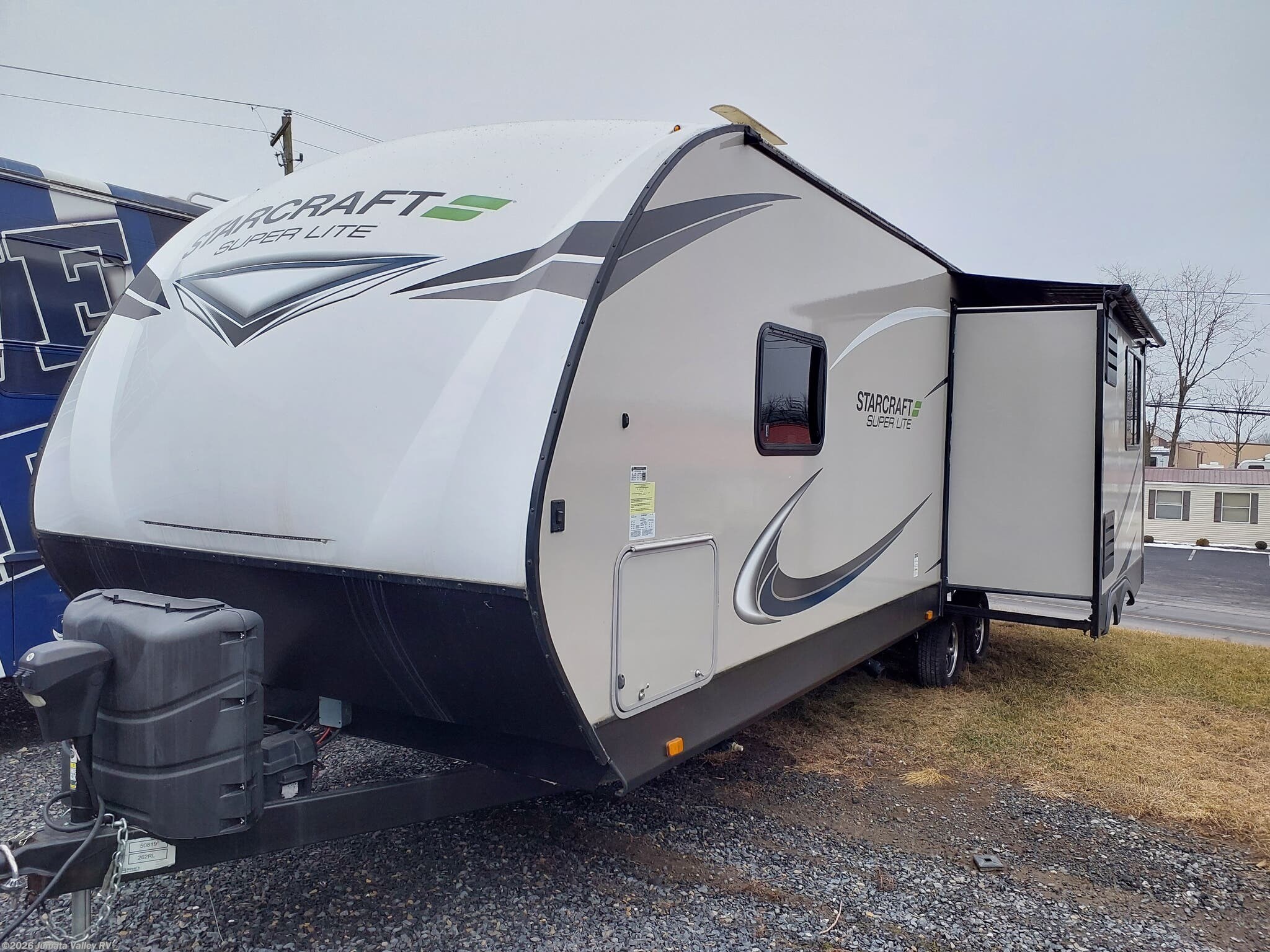 2021 Starcraft Super Lite 262RL - Used Travel Trailer For Sale by Juniata Valley RV in Mifflintown, Pennsylvania features Enclosed Underbelly, TV, Refrigerator, Detachable Power Cord, Roof Vent