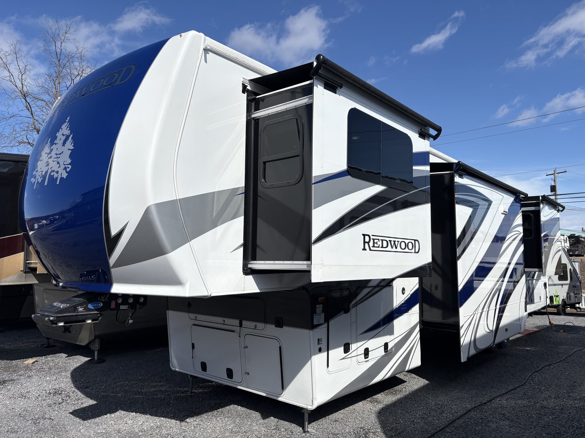 2024 CrossRoads Redwood RW4200FL - New Fifth Wheel For Sale by Juniata Valley RV in Mifflintown, Pennsylvania features Heat Pump, Aluminum Entrance Steps, Exterior Speakers, CD Player, Roof Vent