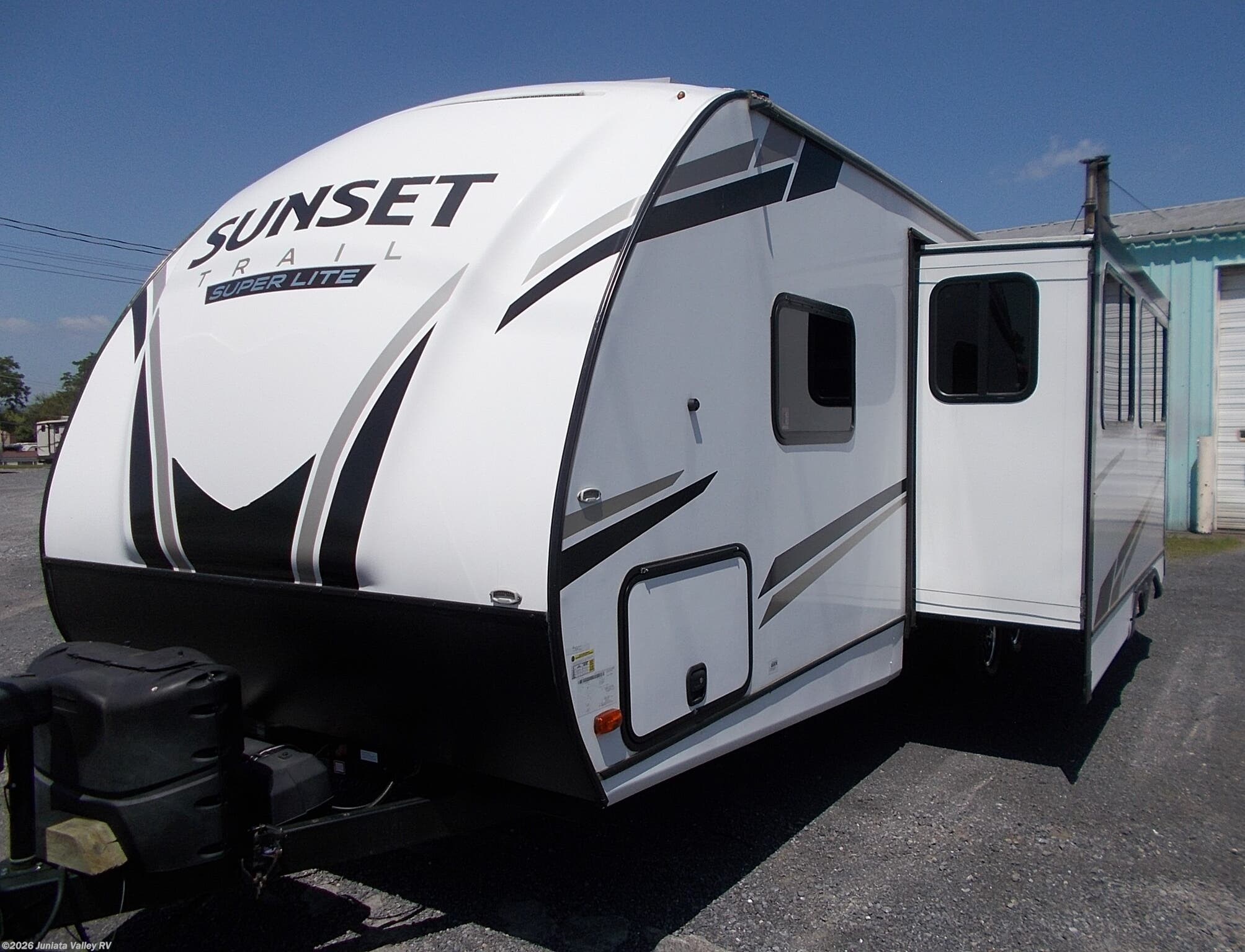 2022 CrossRoads Sunset Trail 253RB - Used Travel Trailer For Sale by Juniata Valley RV in Mifflintown, Pennsylvania features Outside Kitchen, Queen Bed, LED Lights, Satellite Prepped, Theater Seating