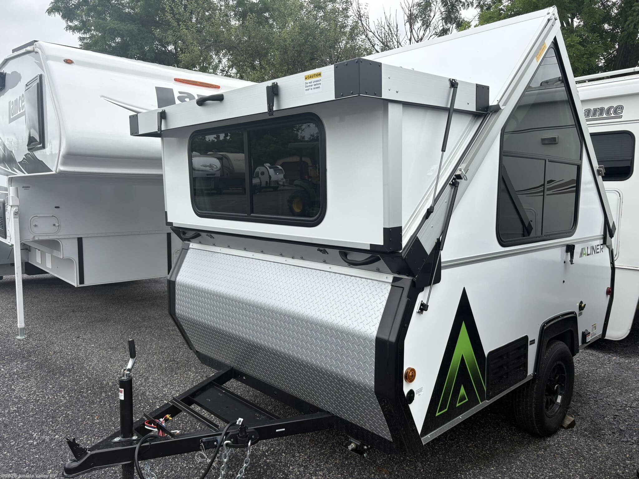 2027 Aliner Scout Lite - New Popup For Sale by Juniata Valley RV in Mifflintown, Pennsylvania features Spare Tire Kit, Fantastic Fan, Power Roof Vent, Dinette Bed, Refrigerator (12V)