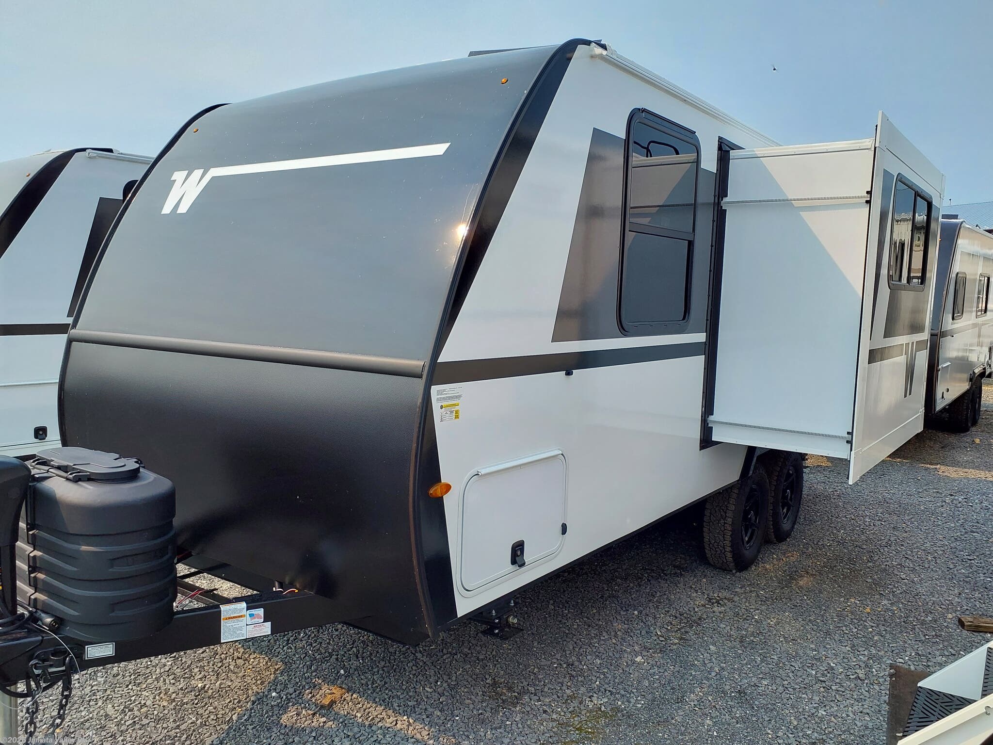 2027 Winnebago Micro Minnie 2108DS - New Travel Trailer For Sale by Juniata Valley RV in Mifflintown, Pennsylvania features LP Detector, Microwave, Queen Bed, Toilet, Fire Extinguisher