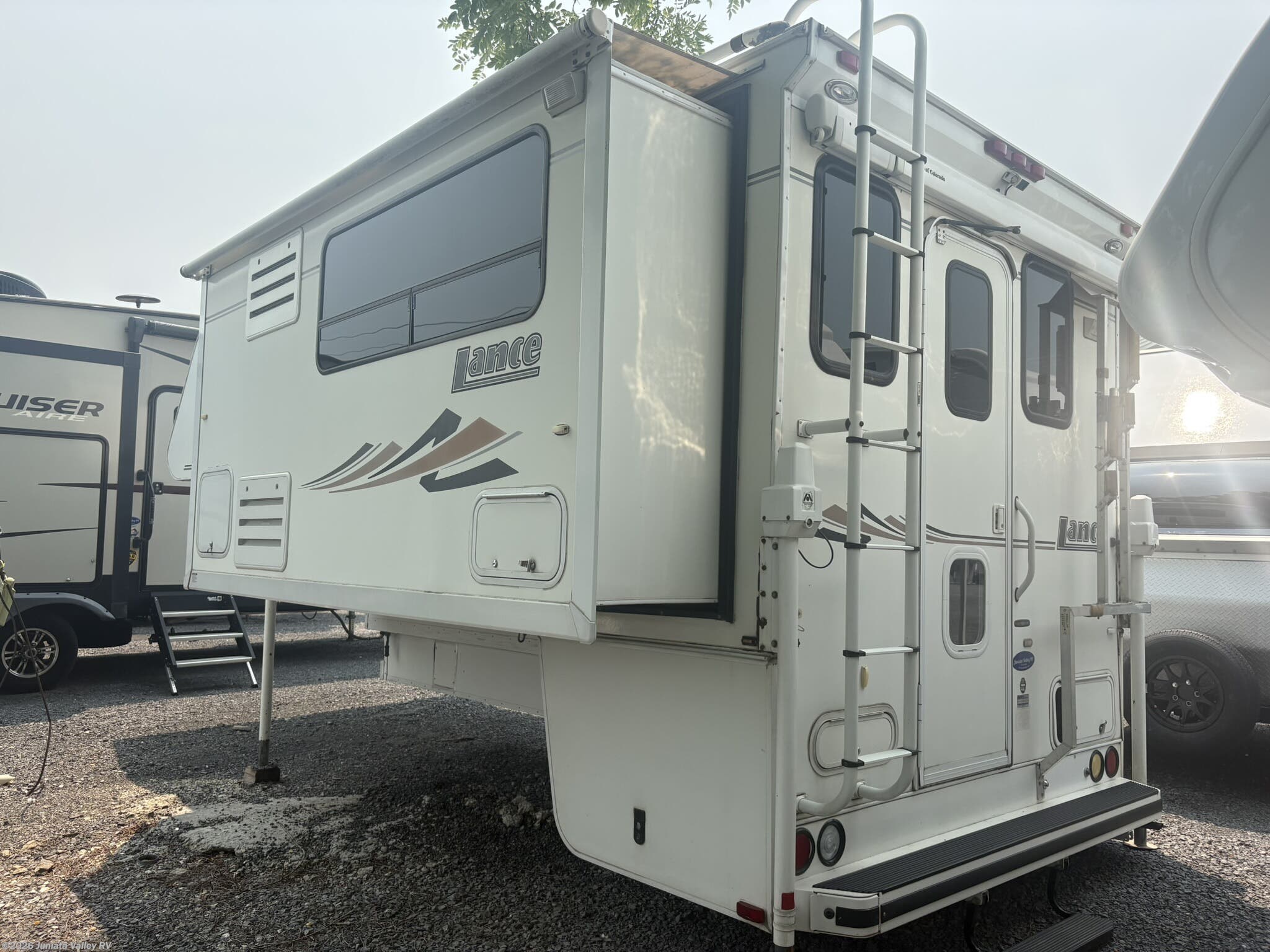 2005 Lance TC 1181 - New Truck Camper For Sale by Juniata Valley RV in Mifflintown, Pennsylvania features Tinted Windows, Heated Water Tank, Pet Friendly, Enclosed Underbelly, Stereo System