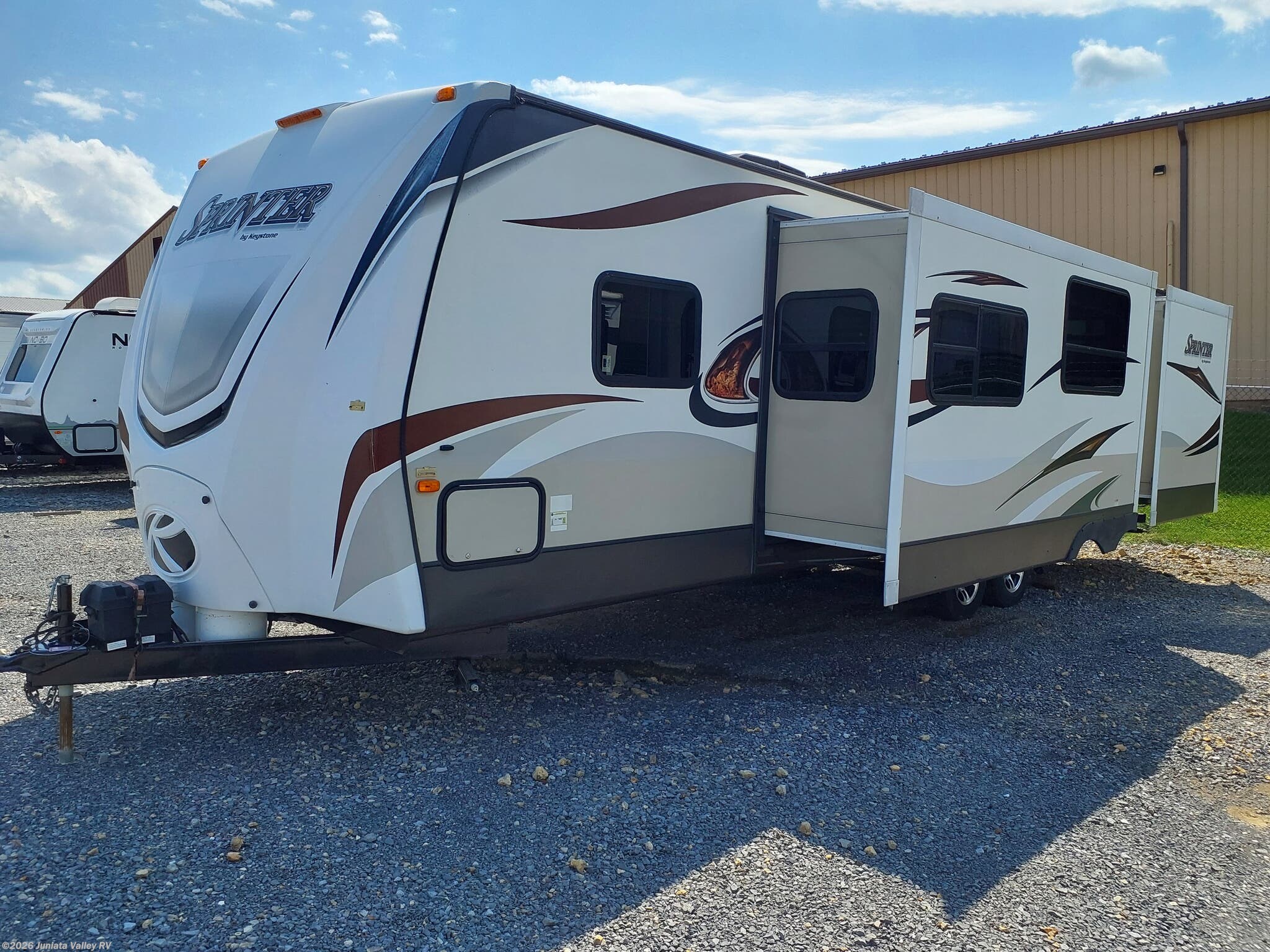 2015 Keystone Sprinter 311BHS - Used Travel Trailer For Sale by Juniata Valley RV in Mifflintown, Pennsylvania features Power Awning, Smoke Detector, Enclosed Underbelly, Pass Thru Storage, Outside Kitchen