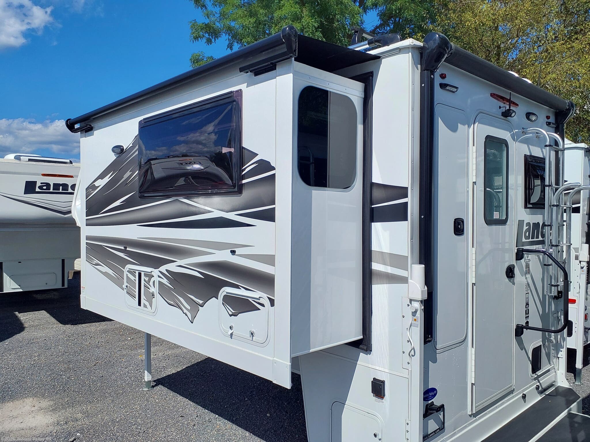 2027 Lance TC 975 - New Truck Camper For Sale by Juniata Valley RV in Mifflintown, Pennsylvania features TV, Dinette Bed, Solar Panel, Self Contained, Dinette