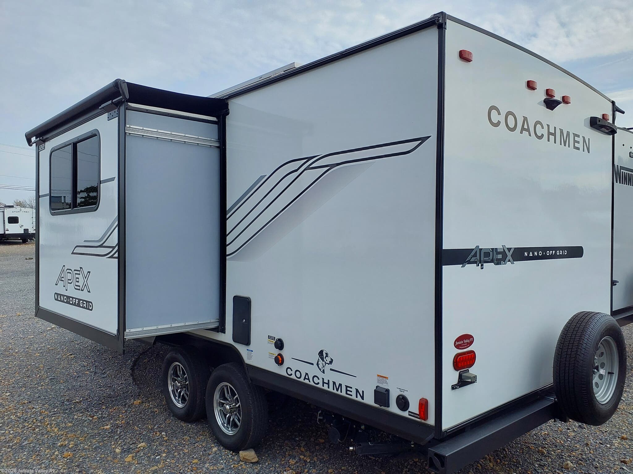 2025 Coachmen Apex Nano 203RBK - Used Travel Trailer For Sale by Juniata Valley RV in Mifflintown, Pennsylvania features Refrigerator, Spare Tire Kit, Bluetooth Stereo, Toilet, Outside Kitchen