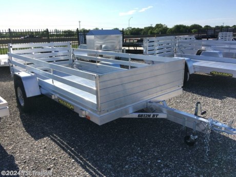 &lt;h3&gt; 2023 Aluma Single Heavy Axle Utility 6812H&lt;/h3&gt;&lt;p&gt; Aluma&#39;s heavy duty single-axle aluminum utility trailers include tilt beds for easy transfer of cars and show autos, as well as many other flatbed options.&lt;/p&gt;&lt;strong&gt;Features may include:&lt;/strong&gt;&lt;ul&gt; &lt;li&gt; ST205/75R14 LRC radial tires (1760 lbs. cap/tire)&lt;/li&gt;&lt;/ul&gt;&lt;ul&gt; &lt;li&gt; Aluminum wheels, 5-4.5 BHP&lt;/li&gt;&lt;/ul&gt;&lt;ul&gt; &lt;li&gt; Aluminum fenders&lt;/li&gt;&lt;/ul&gt;&lt;ul&gt; &lt;li&gt; Extruded aluminum floor&lt;/li&gt;&lt;/ul&gt;&lt;ul&gt; &lt;li&gt; Front retaining rail&lt;/li&gt;&lt;/ul&gt;&lt;ul&gt; &lt;li&gt; A-Framed aluminum tongue, 48&quot; long with 2&quot; coupler&lt;/li&gt;&lt;/ul&gt;&lt;ul&gt; &lt;li&gt; 6) Stake pockets (3 per side)&lt;/li&gt;&lt;/ul&gt;&lt;ul&gt; &lt;li&gt; Swivel tongue jack, 800 lbs. capacity&lt;/li&gt;&lt;/ul&gt;&lt;ul&gt; &lt;li&gt; LED Lighting package, safety chains&lt;/li&gt;&lt;/ul&gt;&lt;ul&gt; &lt;li&gt; Aluminum tailgate - 67.5&quot; wide x 44&quot; lon&lt;/li&gt;&lt;/ul&gt;&lt;ul&gt; &lt;li&gt; 5 Year Warranty&lt;/li&gt;&lt;/ul&gt; http://www.tsitrailers.com/--xInventoryDetail?id=8783551