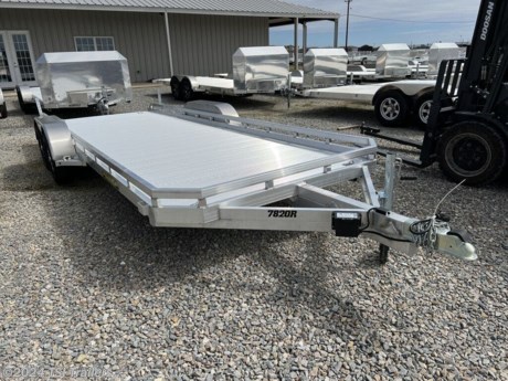 &lt;h3&gt; 2024 Aluma Tandem Axle Trailers 7820R&lt;/h3&gt;&lt;p&gt; Aluma offers a wide range of tandem axle trailers for a wide range of applications, from car hauling and snowmobiles to UTVs and more. Durable aluminum tandem axle trailers are lightweight, corrosion-resistant and maintenance-free.&lt;/p&gt;&lt;strong&gt;Features may include:&lt;/strong&gt;&lt;ul&gt; &lt;li&gt; 2-3500 lbs. Rubber torsion axles - Easy lube hubs&lt;/li&gt;&lt;/ul&gt;&lt;ul&gt; &lt;li&gt; Electric brakes, breakaway kit&lt;/li&gt;&lt;/ul&gt;&lt;ul&gt; &lt;li&gt; ST205/75R14 LRC radial tires (1760 lbs. cap/tire)&lt;/li&gt;&lt;/ul&gt;&lt;ul&gt; &lt;li&gt; Aluminum wheels, 5-4.5 BHP&lt;/li&gt;&lt;/ul&gt;&lt;ul&gt; &lt;li&gt; Removable aluminum fenders&lt;/li&gt;&lt;/ul&gt;&lt;ul&gt; &lt;li&gt; Extruded aluminum floor&lt;/li&gt;&lt;/ul&gt;&lt;ul&gt; &lt;li&gt; Front &amp;amp; side retaining rails&lt;/li&gt;&lt;/ul&gt;&lt;ul&gt; &lt;li&gt; A-Framed aluminum tongue, 48&quot; long with 2-5/16&quot; coupler&lt;/li&gt;&lt;/ul&gt;&lt;ul&gt; &lt;li&gt; 2) 5&#39; Aluminum ramps with storage underneath (7812 has 4&#39; ramps standard)&lt;/li&gt;&lt;/ul&gt;&lt;ul&gt; &lt;li&gt; 6) Stake pockets (3 per side) (7812 - 4) stake pockets, 2 per side)&lt;/li&gt;&lt;/ul&gt;&lt;ul&gt; &lt;li&gt; 4) Recessed tie rings, SS 2000 lbs.&lt;/li&gt;&lt;/ul&gt;&lt;ul&gt; &lt;li&gt; 2) Drop-down rear stabilizer jacks&lt;/li&gt;&lt;/ul&gt;&lt;ul&gt; &lt;li&gt; Single-wheel swivel tongue jack, 1500 lbs. capacity&lt;/li&gt;&lt;/ul&gt;&lt;ul&gt; &lt;li&gt; LED Lighting package, safety chains&lt;/li&gt;&lt;/ul&gt;&lt;ul&gt; &lt;li&gt; Pull out ramps 2-5&#39;&lt;/li&gt;&lt;/ul&gt;&lt;ul&gt; &lt;li&gt; &amp;nbsp;&lt;/li&gt;&lt;/ul&gt; http://www.tsitrailers.com/--xInventoryDetail?id=13540697