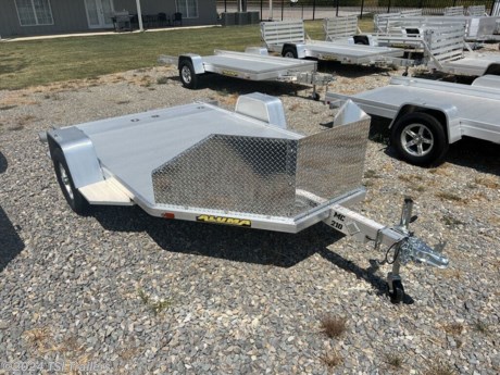 &lt;h3&gt; 2024 Aluma Motorcycle Trailers MC210&lt;/h3&gt;&lt;p&gt; Aluma offers a complete aluminum motorcycle trailer line. Whether you need a pull behind motorcycle trailer to haul your cargo, or a towable motorcycle or trike trailer, Aluma gets you there quickly and reliably.&lt;/p&gt;&lt;strong&gt;Features may include:&lt;/strong&gt;&lt;ul&gt; &lt;li&gt; 3500 lbs Rubber torsion axle - No brakes - Easy lube hubs&lt;/li&gt;&lt;/ul&gt;&lt;ul&gt; &lt;li&gt; ST205/75R14 LRC radial trail (1760 lbs cap/tire)&lt;/li&gt;&lt;/ul&gt;&lt;ul&gt; &lt;li&gt; Aluminum wheels, 5-4.5 BHP&lt;/li&gt;&lt;/ul&gt;&lt;ul&gt; &lt;li&gt; Aluminum fenders&lt;/li&gt;&lt;/ul&gt;&lt;ul&gt; &lt;li&gt; Extruded aluminum floor&lt;/li&gt;&lt;/ul&gt;&lt;ul&gt; &lt;li&gt; 8) Stainless steel recessed tie rings (4 per front &amp;amp; rear)&lt;/li&gt;&lt;/ul&gt;&lt;ul&gt; &lt;li&gt; Aluminum pull-out ramp (63.25&quot; wide x 69.5&quot; long)&lt;/li&gt;&lt;/ul&gt;&lt;ul&gt; &lt;li&gt; Aluminum salt shield / rock guard (24&quot; tall)&lt;/li&gt;&lt;/ul&gt;&lt;ul&gt; &lt;li&gt; 2) 2&#39; Motorcycle brackets&lt;/li&gt;&lt;/ul&gt;&lt;ul&gt; &lt;li&gt; LED Lighting package, safety chains&lt;/li&gt;&lt;/ul&gt;&lt;ul&gt; &lt;li&gt; Swivel tongue jack, 1200 lbs capacity&lt;/li&gt;&lt;/ul&gt;&lt;ul&gt; &lt;li&gt; 2&quot; Coupler&lt;/li&gt;&lt;/ul&gt; http://www.tsitrailers.com/--xInventoryDetail?id=14312395