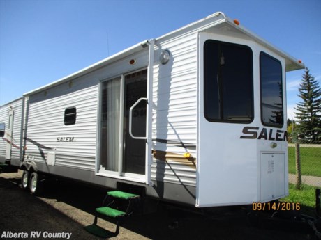 
&lt;p&gt;&lt;span style=&quot;font-weight: bold; font-style: italic; color: rgb(0, 96, 0);&quot;&gt;Very Nice Looking Park Trailer, offen called a Destination Trailer.&lt;/span&gt;&lt;/p&gt;
&lt;p&gt;&lt;span style=&quot;font-weight: bold; font-style: italic;&quot;&gt;New Flooring going into trailer.&lt;/span&gt;&lt;/p&gt;
&lt;p&gt;&lt;span style=&quot;font-weight: bold; font-style: italic;&quot;&gt;Comes with Simless Windows, Patio Doors, and many other options and features:&lt;br /&gt;
		&lt;/span&gt;&lt;span style=&quot;font-style: italic;&quot;&gt;&lt;span style=&quot;font-weight: bold;&quot;&gt;Rear Queen Bed and Sofia/Dinette Slides. &amp;nbsp;&lt;br /&gt;
			&lt;/span&gt;&lt;span style=&quot;font-weight: bold;&quot;&gt;Extra Large Awning&lt;/span&gt;&lt;/span&gt;&lt;/p&gt;
&lt;p&gt;&lt;span style=&quot;font-weight: bold; font-style: italic; color: rgb(0, 64, 235);&quot;&gt;Dealer Financing Available (oac) (100% Financed at $165/m&amp;nbsp;&lt;/span&gt;&lt;/p&gt;
&lt;p&gt;&lt;span style=&quot;color: rgb(143, 42, 0); font-weight: bold; font-style: italic;&quot;&gt;Let&#39;s Make a Deal! &lt;br /&gt;
		Buy Now, and we will &lt;span style=&quot;text-decoration: underline;&quot;&gt;Store it for you over the winter for Free, plus Free delivery within 300 Km in the Spring!&amp;nbsp;&lt;/span&gt;&lt;/span&gt;&lt;/p&gt;
&lt;p&gt;&lt;span style=&quot;font-weight: bold;&quot;&gt;&lt;/span&gt;&lt;/p&gt;
&lt;div style=&quot;text-align: center;&quot;&gt;&lt;span style=&quot;color: rgb(51, 51, 51); font-family: Arial, Verdana, sans-serif; font-size: 18px;&quot;&gt;&amp;nbsp;&lt;/span&gt;&lt;/div&gt;&lt;span style=&quot;font-size: 18px; font-family: Arial, Verdana, sans-serif;&quot;&gt;
	&lt;div style=&quot;color: rgb(51, 51, 51); text-align: center;&quot;&gt;Extended Warranty available&lt;/div&gt;
	&lt;div style=&quot;color: rgb(51, 51, 51); text-align: center;&quot;&gt;&amp;nbsp;&lt;/div&gt;
	&lt;div style=&quot;text-align: center;&quot;&gt;&amp;nbsp;&lt;span style=&quot;color: rgb(14, 79, 144); font-weight: bold;&quot;&gt;&lt;br /&gt;
			&lt;/span&gt;&lt;span style=&quot;color: rgb(14, 79, 144); font-weight: bold;&quot;&gt;855-727-5500&lt;br /&gt;
			&lt;/span&gt;&lt;span style=&quot;color: rgb(14, 79, 144); font-weight: bold;&quot;&gt;4207 52nd Street Close&lt;br /&gt;
			&lt;/span&gt;&amp;nbsp;&lt;span style=&quot;font-weight: bold;&quot;&gt;West of Hwy# 2A, Innisfail, AB&lt;/span&gt;&lt;/div&gt;
	&lt;p style=&quot;text-align: center;&quot;&gt;&lt;span style=&quot;color: rgb(235, 70, 0); font-weight: bold;&quot;&gt;We are Easy to Deal with, and Easy to get to&lt;/span&gt;&lt;/p&gt;&lt;span style=&quot;text-align: center; font-weight: bold; font-family: Arial, Helvetica, sans-serif; text-decoration: underline;&quot;&gt;
		&lt;div&gt;&lt;span style=&quot;font-size: 14px;&quot;&gt;&lt;/span&gt;&lt;/div&gt;
		&lt;div style=&quot;font-size: 16px;&quot;&gt;&lt;span style=&quot;font-size: 14px;&quot;&gt;!&lt;/span&gt;&lt;/div&gt;&lt;/span&gt;&lt;/span&gt;
&lt;p&gt;&amp;nbsp;&lt;/p&gt; 
