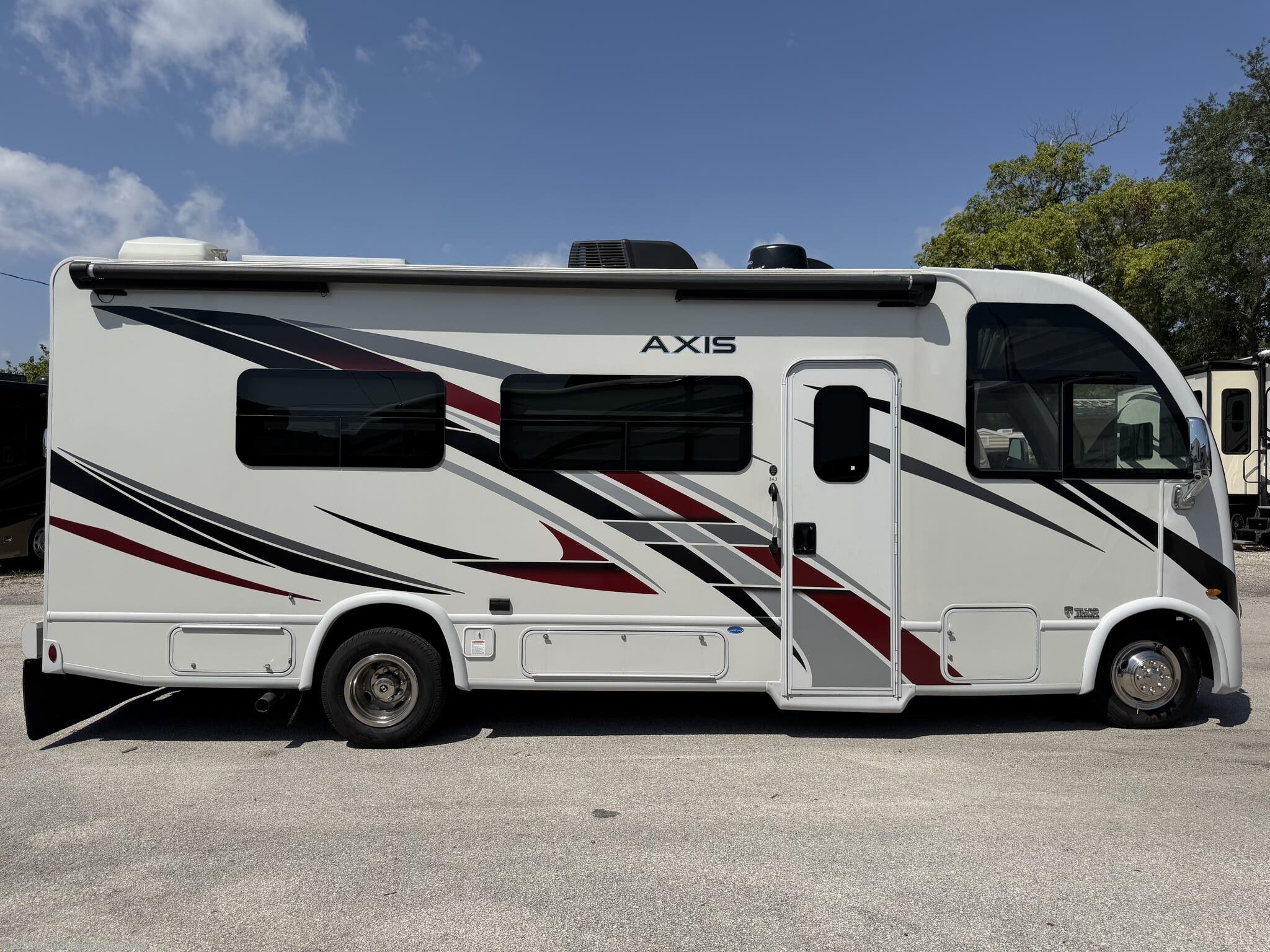 2023 Thor Axis 24.3 - Used Class A For Sale by Central Florida RV Center in Apopka, Florida features Water Heater, Refrigerator, Leveling Jacks, Roof Vents, Queen Bed