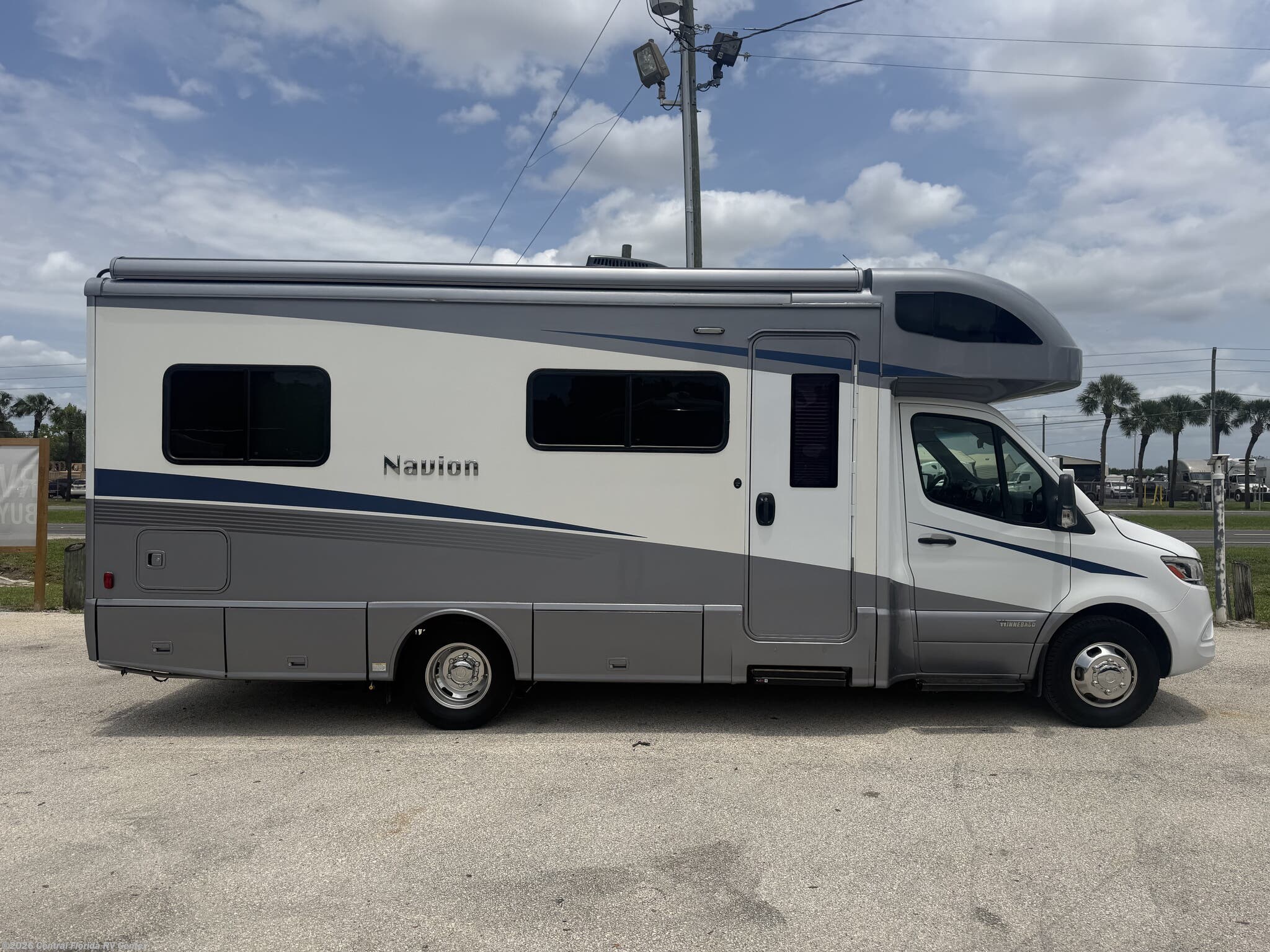 2022 Winnebago Navion 24V - Used Class C For Sale by Central Florida RV Center in Apopka, Florida features Refrigerator, Inverter, Ladder, Self Contained, Slideout