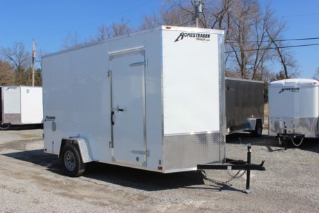 2022 HOMESTEADER 6&#39; X 12&#39; ENCLOSED CARGO TRAILER FOR SALE, WHITE EXTERIOR ALUMINUM, 24&quot; V-NOSE, 32&quot; SIDE DOOR WITH BAR LOCK, REAR DOUBLE DOORS WITH HOLDBACKS, 3/4&quot; PLYWOOD FLOOR, 3/8&quot; PLYWOOD WALLS, SIDE WALL FLOW THRU VENTS, DOME LIGHT, 3.5K IDLER AXLE, SPRING SUSPENSION, 15&quot; RADIAL TIRES, LED EXTERIOR LIGHTS, 84&quot; INTERIOR HEIGHT, 16&quot; ON CENTER WALL POSTS, A-FRAME JACK, 2&quot; COUPLER.