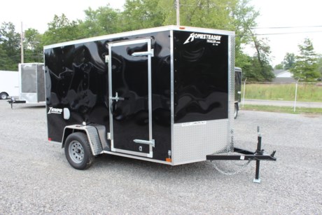 2022 HOMESTEADER 6  X 10  ENCLOSED CARGO TRAILER FOR SALE, BLACK EXTERIOR ALUMINUM, 24  V-NOSE, 32  SIDE DOOR WITH BAR LOCK, REAR RAMP DOOR WITH EXTENDED WOOD FLAP, 3/4  PLYWOOD FLOOR, (4) FLOOR MOUNT D-RINGS, 3/8  PLYWOOD WALLS, SIDE WALL FLOW THRU VENTS, DOME LIGHT, 3.5K IDLER AXLE, SPRING SUSPENSION, 15  RADIAL TIRES, LED EXTERIOR LIGHTS, 72  INTERIOR HEIGHT, A-FRAME JACK, 2  COUPLER.