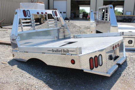 BRADFORD BUILT 84&quot; X 84&quot; ALUMINUM WORKBED, 40&quot; CAB TO AXLE, 38&quot; FRAME WIDTH, FITS A SINGLE WHEEL SHORT BED (FORD) TRUCK, 4&quot; FOLD DOWN SIDES, LED LIGHTS, LIGHTED HEADACHE RACK, 30K RATED GOOSENECK HITCH, 2-1/2&quot; REAR RECEIVER HITCH, MUDFLAPS, SEALED WIRING HARNESS, STEEL SUB FRAME, REAR TAPERED CORNERS. Please check with us for exact fitment as makes vary slightly.