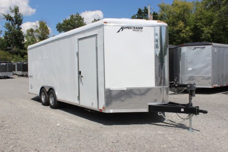 2023 HOMESTEADER 8.5  X 20  ENCLOSED CARGO TRAILER, ROUND TOP WITH WEDGE NOSE, 2-5.2K ELECTRIC BRAKE TORSION AXLES, 15  RADIAL TIRES, SPARE TIRE, SPARE HOLDER - INTERIOR MOUNT (LOOSE), 3/8  PLYWOOD WALLS, 3/4  PLYWOOD FLOOR, 16  ON CENTER CROSS MEMBERS, 16  ON CENTER WALL POSTS, 84  INTERIOR HEIGHT, WHITE ALUMINUM EXTERIOR (SCREWLESS), FLOW THRU SIDEWALL VENTS, LED LIGHTS, 24  STONE GUARD ON FRONT, REAR RAMP DOOR WITH SPRING ASSIST AND EXTENDED WOOD FLAP, 36  BONDED SIDE DOOR W/ BARLOCK AND LOCKABLE HASP, 24  PULL OUT SINGLE STEP, POLISHED ALUMINUM REAR FRAMEWORK, (3) 12 VOLT LED DOME LIGHTS, DOUBLE LED TAIL LIGHTS, BACK-UP LIGHTS, 2-5/16  ADJUSTABLE COUPLER, A-FRAME JACK, 72  TRIPLE TUBE TONGUE.