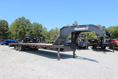 2023 DIAMOND C 35  ENGINEERED BEAM GOOSENECK FLATDECK TRAILER, 5  DOVETAIL WITH 2 FLIP OVER MONSTER RAMPS(44  WIDE, SPRINGLOADED), 2-10K ELECTRIC BRAKE AXLES, SPRING SUSPENSION, ST235/80R16  10 PLY TIRES, SPARE TIRE IN NECK, BLACK WHEELS, 2-5/16  BULLDOG ADJUSTABLE GN COUPLER, 2-12K DROP LEG JACKS, RETRACTABLE FRONT DECK STEPS, MID-DECK STEP ON BOTH SIDES, FRONT TOOLBOX BETWEEN GN RISERS, WINCH MOUNTING PLATE WITH RECEIVER TUBE, TREATED WOOD FLOOR, 6  CHANNEL LACE RAIL, 3  I-BEAM CROSS-MEMBERS ON 16  CENTERS, RUB RAIL WITH STAKE-POCKETS AND PIPE-SPOOLS, 16  TALL ENGINEERED I-BEAM, CAMBERED DECK AND FRAME, APPROXIMATELY 34  DECK HEIGHT, 102  OVERALL WIDTH, SEALED WIRING HARNESS, LED LIGHTS, METALLIC GRAY, DM DIFFERENCE MAKER COATING SYSTEM, 3 YEAR STRUCTURE WARRANTY.