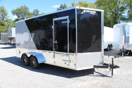 2023 HOMESTEADER 7  X 16  ENCLOSED CARGO TRAILER FOR SALE, OHV PACKAGE, BLACK / SILVER MIST SLANT TWO TONE ALUMINUM EXTERIOR, 2-3.5K ELECTRIC BRAKE AXLES, SPRING SUSPENSION, 15 INCH RADIAL TIRES, ALUMINUM WHEELS, FLAT TOP, V-NOSE, 7 FOOT INTERIOR HEIGHT, 16 INCH ON CENTER WALL POSTS AND FLOOR CROSSMEMBERS, REAR RAMP DOOR WITH EXTENDED WOOD FLAP, 32 INCH SIDE DOOR WITH BAR LOCK, 3/4  PLYWOOD FLOOR, 3/8  PLYWOOD WALLS, FLOW THRU VENTS - SIDEWALL, (4) RECESSED FLOOR MOUNT D-RINGS, ALUMINUM TREAD PLATE ON SIDES AND REAR (24 INCH TALL), A-FRAME JACK, 2-5/16  COUPLER.