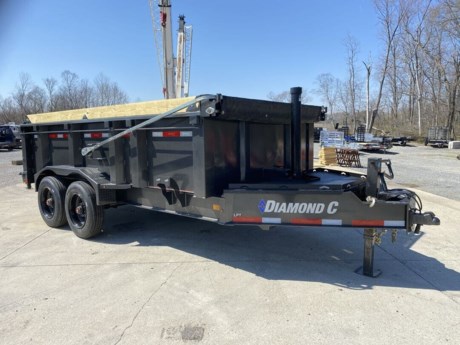 2023 DIAMOND C 14  X 82  HEAVY DUTY 20K LOW PROFILE DUMP TRAILER, HD V-TONGUE LID, TELESCOPIC CYLINDER HOIST, POWER UP AND GRAVITY DOWN, 2-5/16  - 20K ADJUSTABLE COUPLER, 12K DROP LEG JACK, 7GA (3/16 ) BODY, FLOOR AND SIDES, 16  ON CENTER CROSSMEMBERS, 3/16  DIAMOND PLATE FENDERS, 2-10K OIL BATH TORFLEX AXLES, ELECTRIC DRUM BRAKES, ST215/75R17.5  16 PLY TIRES, SPARE MOUNT, 3 WAY SPREADER GATE, 32  HIGH SIDES, HD 78  REAR SLIDE-IN RAMPS, FRONT BULKHEAD FOR TARP MOUNTING AND PROTECTION, 20  TARP INSTALLED, BOARD BRACKETS WITH BOARDS AND RAISED FRONT, (4) HD 5/8  D-RINGS, LED LIGHTS, 7 WATT SOLARPULSE PANEL, METALLIC GRAY, DM DIFFERENCE MAKER COATING SYSTEM, 3 YEAR STRUCTURE WARRANTY.