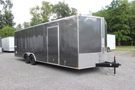 LIGHTLY USED 2021 HOMESTEADER INTREPID 8.5  X 24  ENCLOSED CAR HAULER TRAILER FOR SALE, 78  INTERIOR HEIGHT, 24  V-NOSE WITH TREADPLATE STONEGUARD, 2-3.5K ELECTRIC BRAKE AXLES, SPRING SUSPENSION, 15  RADIAL TIRES, GRAY EXTERIOR ALUMINUM, ONE PIECE ALUMINUM ROOF, 16  ON CENTER FLOOR CROSSMEMBERS AND WALL POSTS, 36  BONDED SIDE DOOR WITH FLUSH MOUNT LOCK, ALUMINUM DOOR HOLDBACK, REAR RAMP DOOR WITH EXTENDED WOOD FLAP, POLISHED ALUM REAR FRAMEWORK, 3/4  PLYWOOD FLOOR, 3/8  PLYWOOD WALLS, 4 FLOOR MOUNT D-RINGS, FLOW THRU SIDE WALL VENTS, INTERIOR DOME LIGHT, LED EXTERIOR LIGHTS, A-FRAME JACK, 2-5/16  A-FRAME COUPLER.