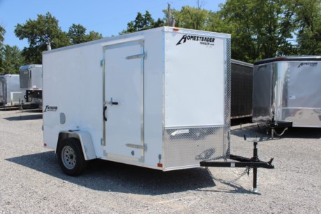 2023 HOMESTEADER 6  X 10  ENCLOSED CARGO TRAILER FOR SALE, WHITE EXTERIOR ALUMINUM, 24  V-NOSE, 32  SIDE DOOR WITH BAR LOCK, REAR DOUBLE DOORS WITH HOLDBACKS, 3/4  PLYWOOD FLOOR, 3/8  PLYWOOD WALLS, (4) FLOOR MOUNT D-RINGS, SIDE WALL FLOW THRU VENTS, DOME LIGHT, 3.5K IDLER AXLE, SPRING SUSPENSION, 15  RADIAL TIRES, LED EXTERIOR LIGHTS, 72  INTERIOR HEIGHT, A-FRAME JACK, 2  COUPLER.