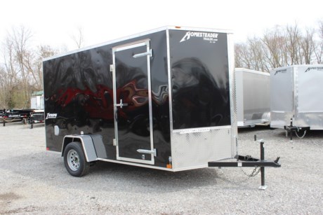 2022 HOMESTEADER 6  X 12  ENCLOSED CARGO TRAILER FOR SALE, BLACK EXTERIOR ALUMINUM, 24  V-NOSE, 32  SIDE DOOR WITH BAR LOCK, REAR RAMP DOOR WITH EXTENDED WOOD FLAP, 78  INTERIOR HEIGHT, 16  ON CENTER WALL POSTS, 3/4  PLYWOOD FLOOR, (4) FLOOR MOUNT D-RINGS, 3/8  PLYWOOD WALLS, SIDE WALL FLOW THRU VENTS, DOME LIGHT, 3.5K IDLER AXLE, SPRING SUSPENSION, 15  RADIAL TIRES, LED EXTERIOR LIGHTS, A-FRAME JACK, 2  COUPLER.