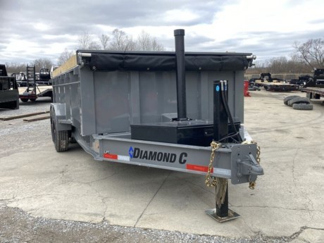 2023 DIAMOND C 16  X 82  HEAVY DUTY 18K LOW PROFILE BUMPER PULL  DUMP TRAILER, 6  X 20  SCISSOR LIFT HOIST, 2-5/16  ADJUSTABLE GN COUPLER, 1-12K HYDRAULIC  JACK, FULL WIDTH FRONT TOOLBOX, ENGINEERED BEAM FRAME, 2-8K ELECTRIC BRAKE OIL BATH AXLES, SPRING SUSPENSION (STRAIGHT AXLES), 215/75R17.5  TIRES, BLACK WHEELS, SPARE TIRE MOUNT, 3 WAY SPREADER GATE, 32  HIGH SIDES, 7 GA (3/16) BODY, FLOOR AND SIDES, 3/16  DIAMOND PLATE HEAVY DUTY FENDERS, HD 72  REAR SLIDE-IN RAMPS, FRONT BULKHEAD FOR TARP MOUNTING AND PROTECTION, 20  TARP INSTALLED, LED LIGHTS, 7 WATT SOLARPULSE PANEL, 3-WAY POWER UNIT (POWER UP, POWER/GRAVITY DOWN), GRAY METALLIC, DM DIFFERENCE MAKER COATING SYSTEM, 3 YEAR STRUCTURE WARRANTY.