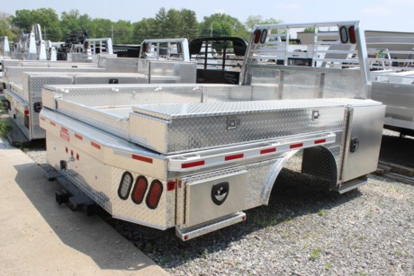 New Zimmerman Ranch Master Aluminum Flatbed, 114&quot; long x 94&quot; wide, fits a dually wheel CAB AND CHASSIS (9 FOOT FRAME) Ford, Dodge, or GM pickup! Equipped with a built in 30k rated B&amp;W gooseneck hitch and a 2-1/2 inch rear receiver hitch. This bed has more box space than most beds with a front 36&quot; long x 28&quot; tall x 16&quot; deep chest box built into the bed and a rear box built into the bed behind the wheel well. Lockable toolboxes with greaseable hinges and smooth aluminum doors. One drawer in left front box and one shelf in right front box. LED tail lights with lighted headache rack and clearance lights. Stake pockets and rub rails. Custom top deck toolbox, 72&quot; long x 8&quot; tall x 16&quot; deep, added on each side for extra storage space! 5 INCH DROP IN TAILBOARD. Zimmerman beds are better built than anything you&#39;ve seen yet with 3/16&quot; aluminum construction this bed is ready for some hard work! We can install this bed in about 6 hours and we have a courtesy vehicle for your use while you wait. Give us a call and schedule your appointment now!